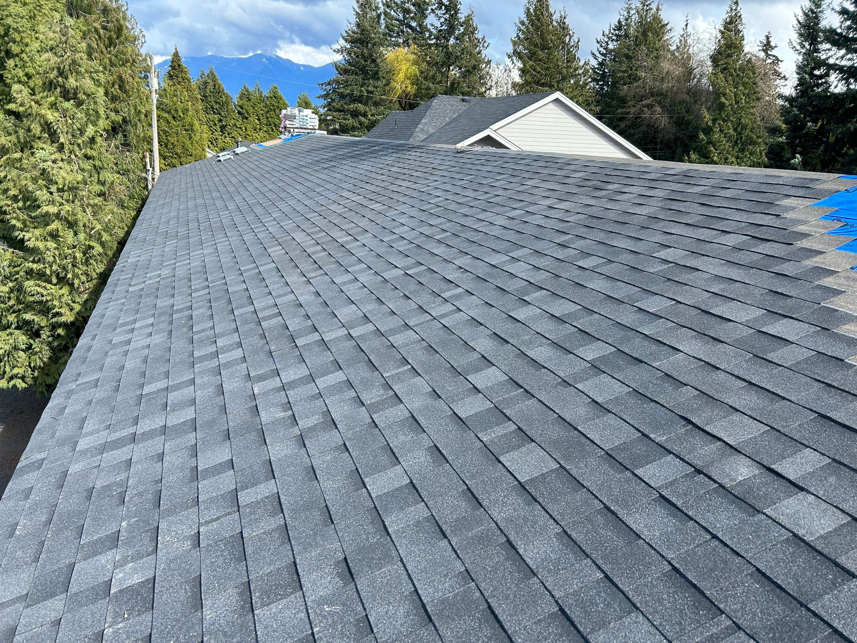 Residential Roofing Installation using IKO Dual Black Biltmore by Top Notch Roofing Inc
