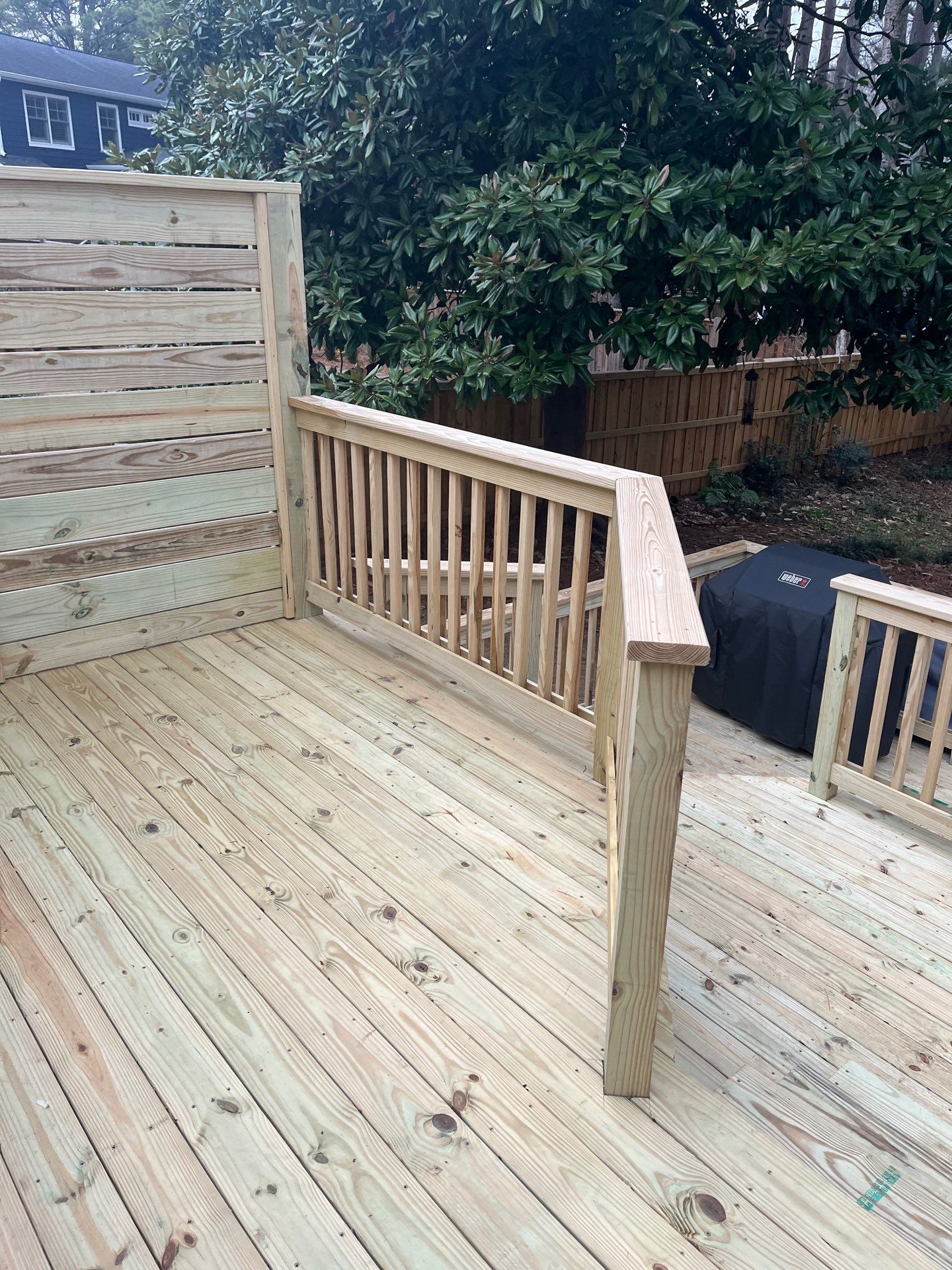 Wood Deck Resurface with Privacy Wall in Buckhead, GA by Nelson Exteriors