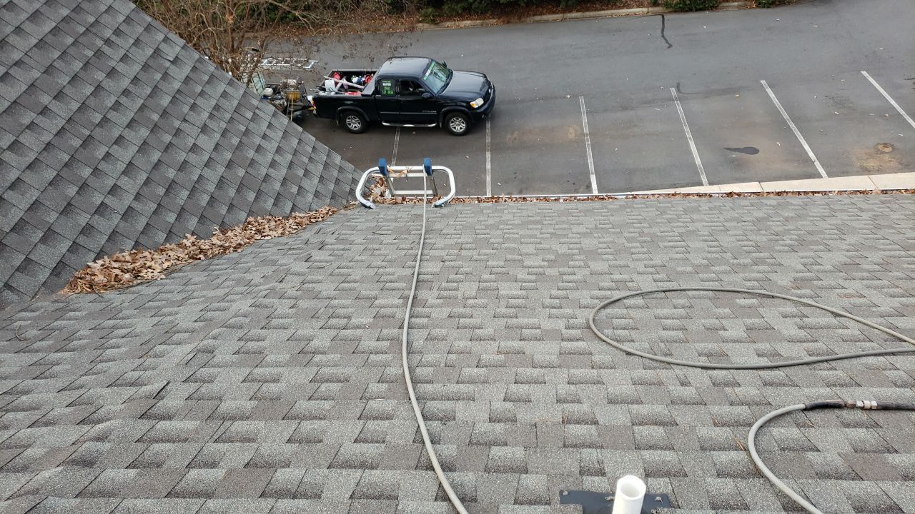Gutter Cleaning using water by Power Wash Masters LLC