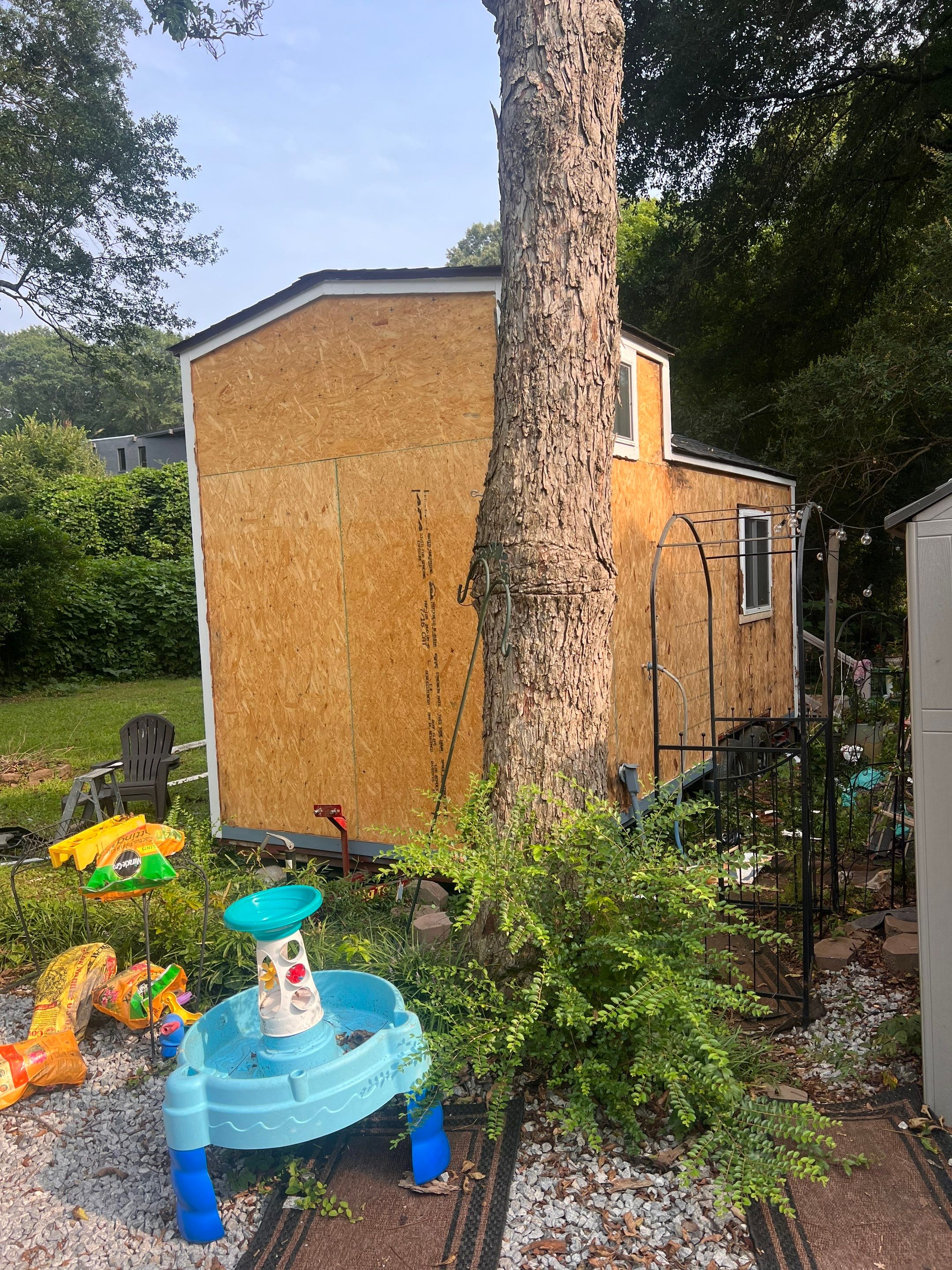 tiny home remodel- siding,paint,roofing by Nailed It Roofing & Remodeling LLC