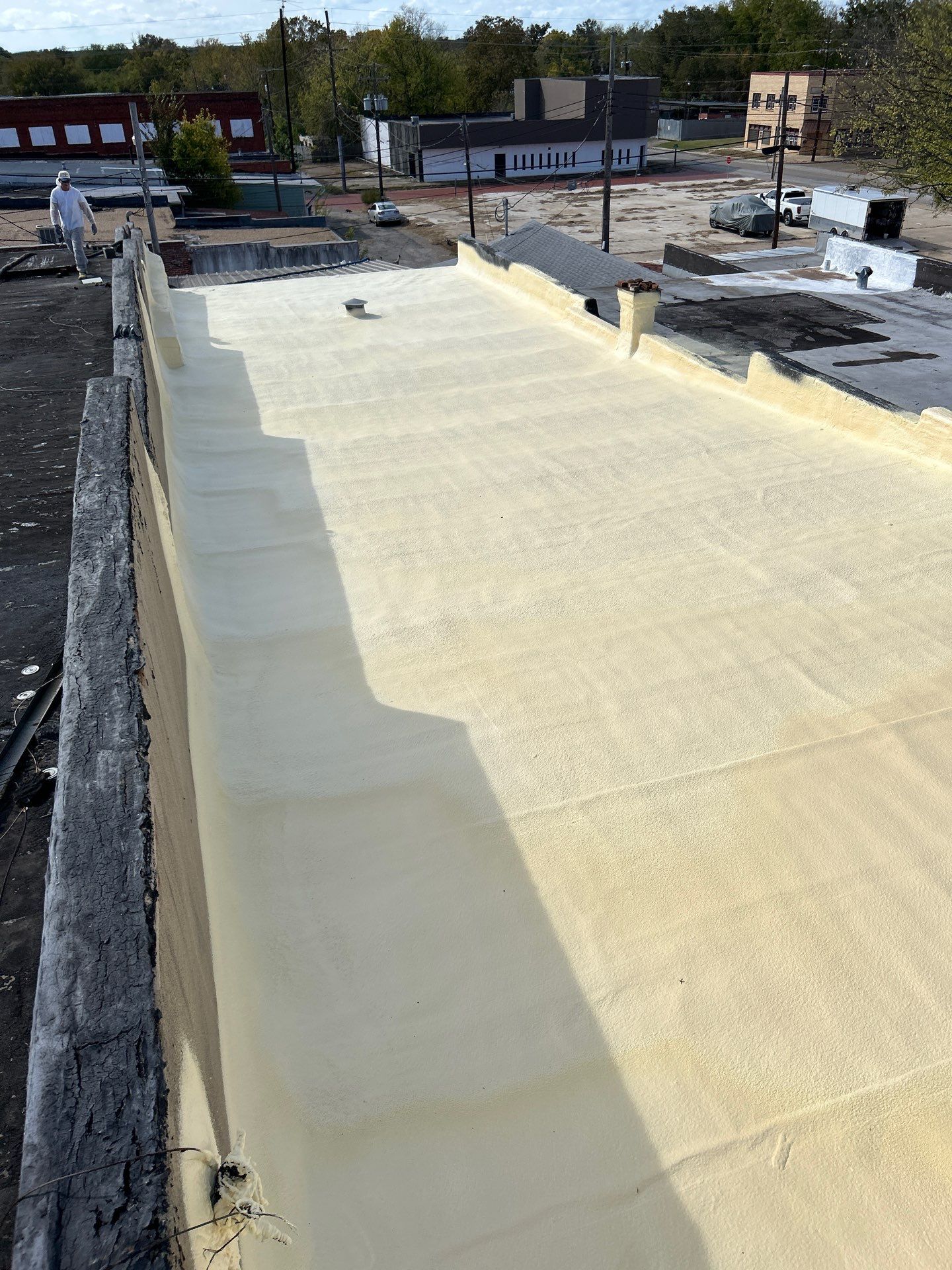 Downtown Gladewater Commercial Foam Roof Restoration – SPF + High-Tensile Acrylic by All Star Roofing LLC