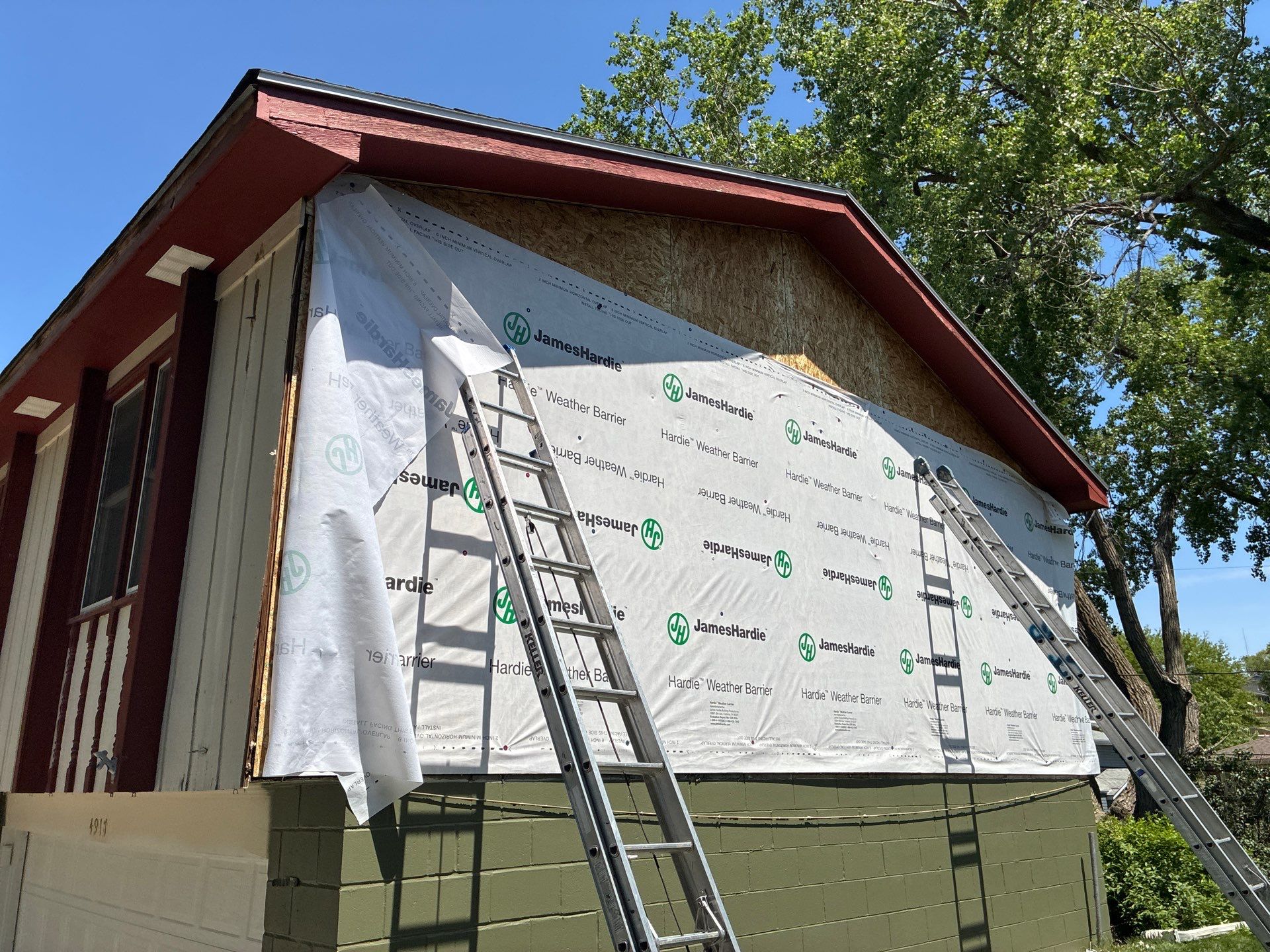 James Hardie Siding Replacement in Omaha with Mountain Sage Finish by Carps Complete Exteriors