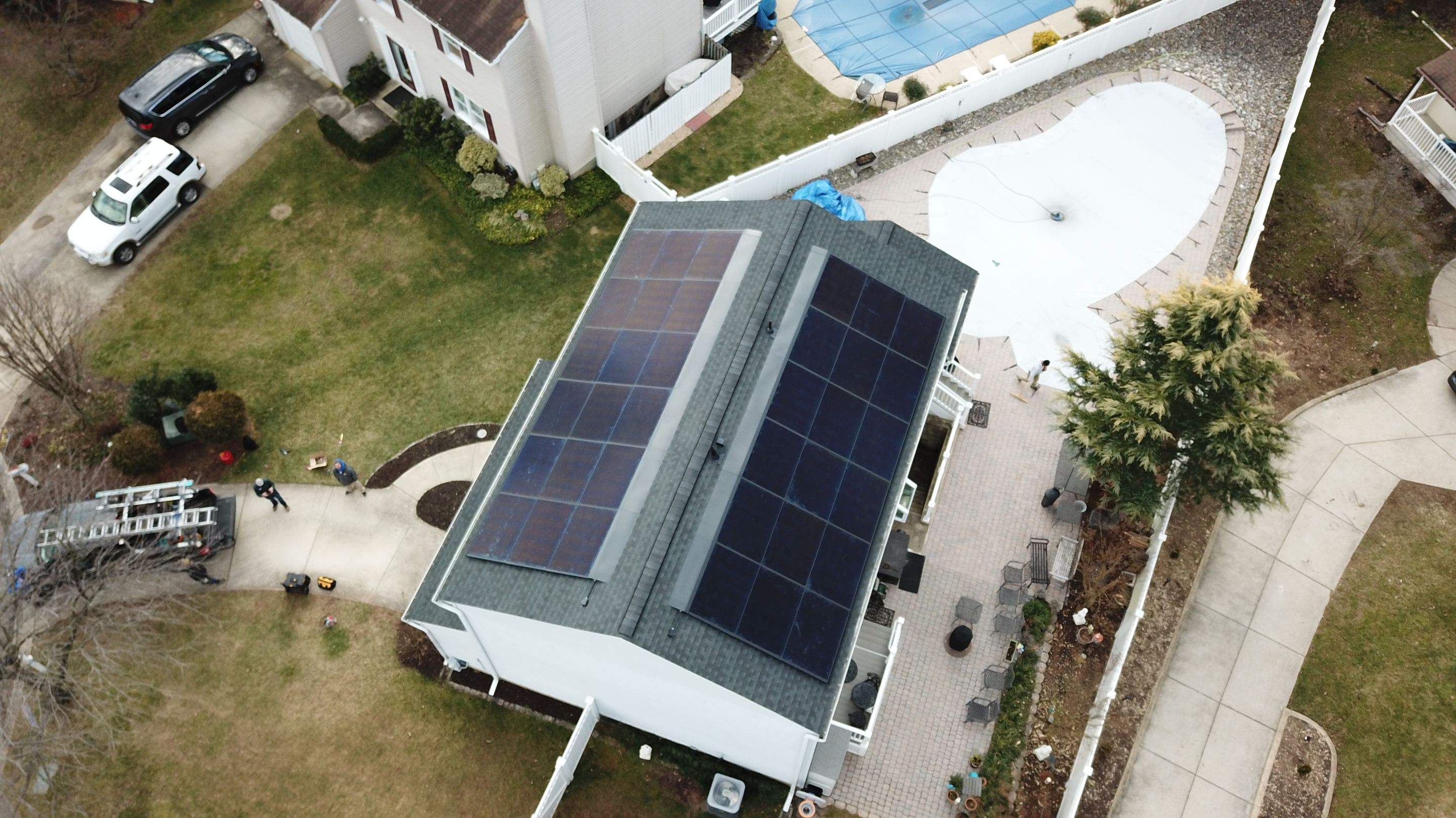 Roof Replacement with GAF Decotech integrated solar panels by American Home Contractors