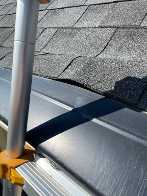 Turtle Shell gutter protection installation in Oak Brook, IL 60523, photograph 4