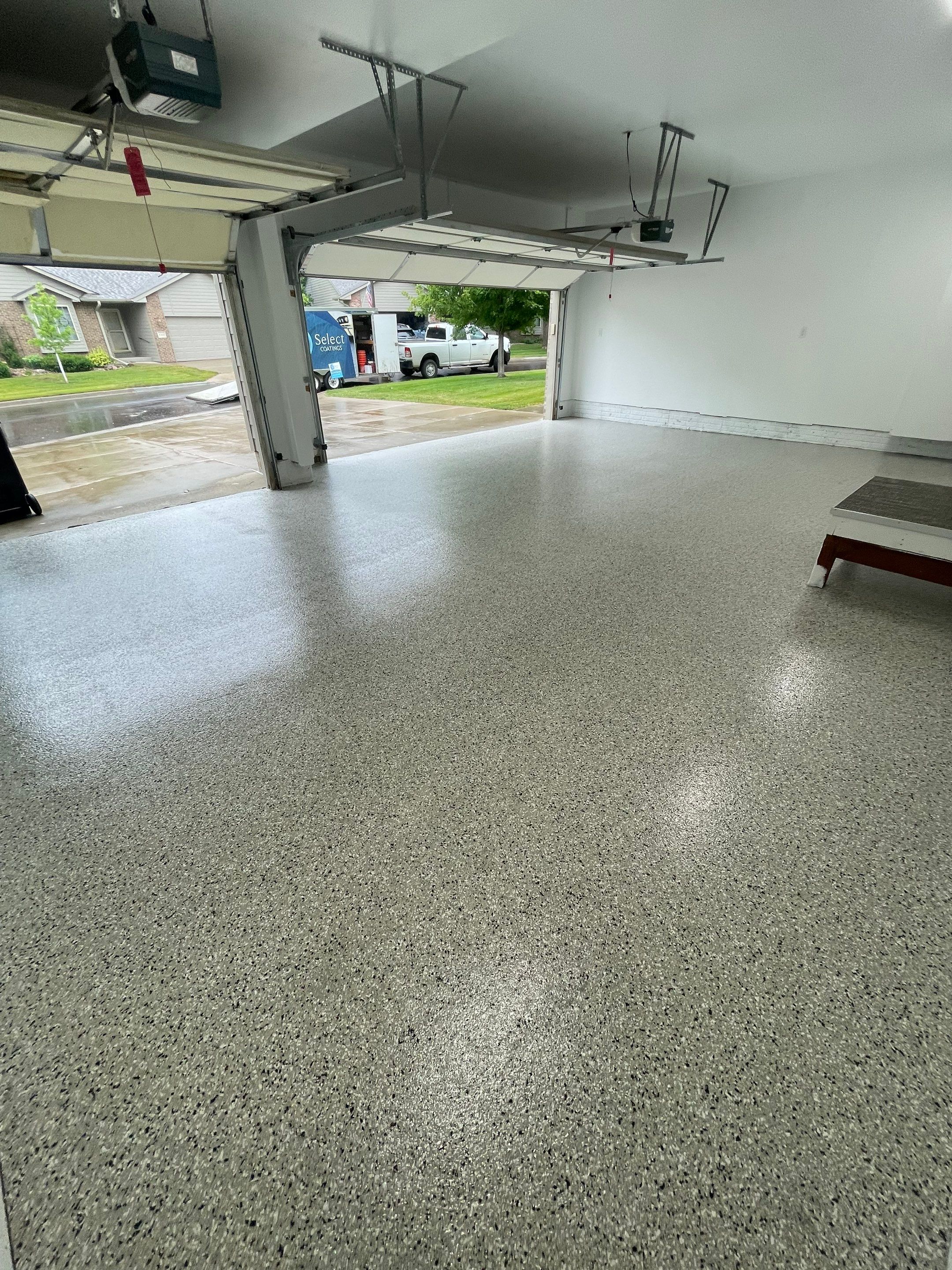 Cabin Fever Garage Floor System in Sioux Falls by Select Painting, Coatings & Garage Cabinets