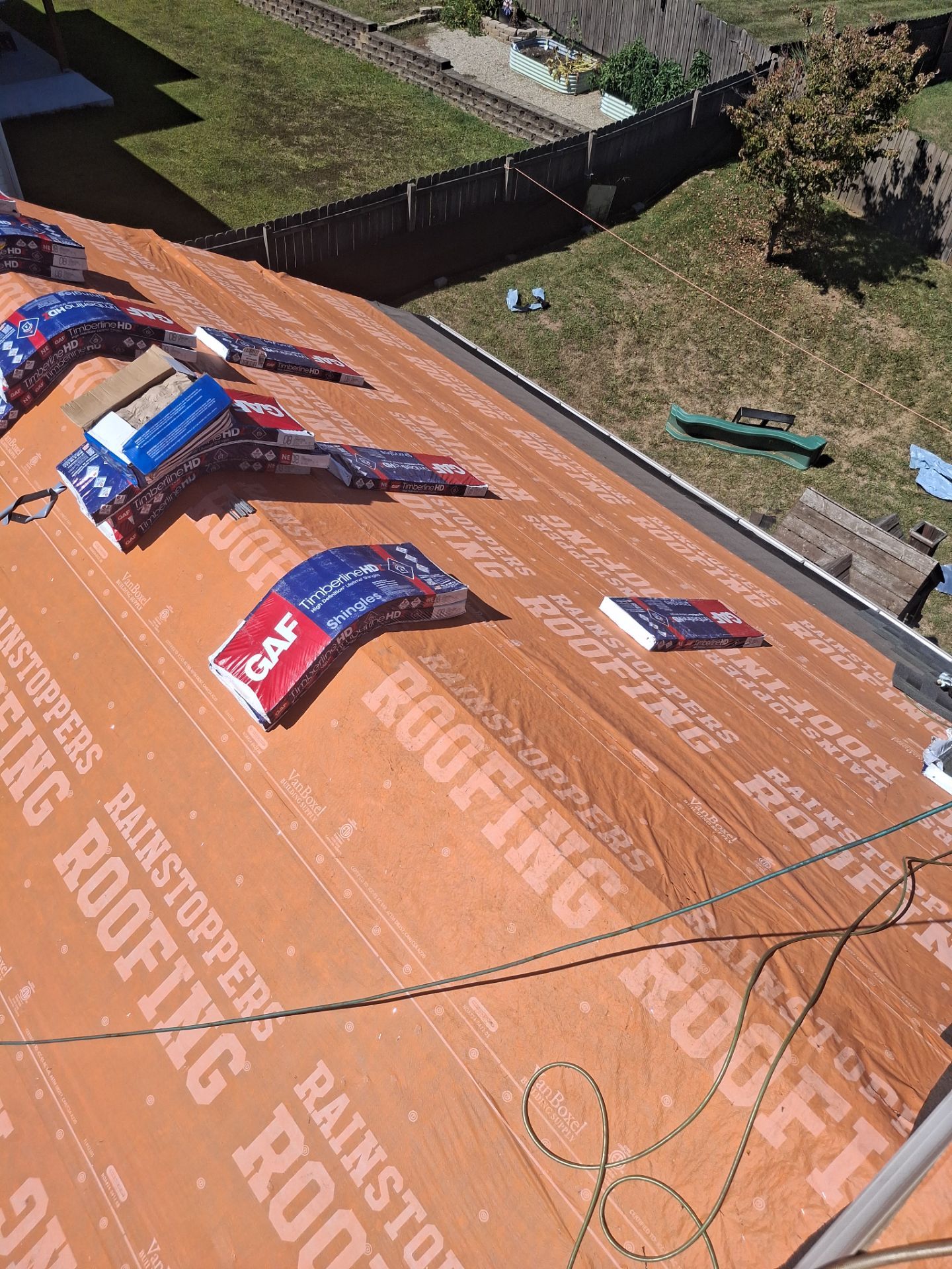 Residential Roofing Installation using GAF Timberline HDZ Charcoal by Rainstoppers Roofing