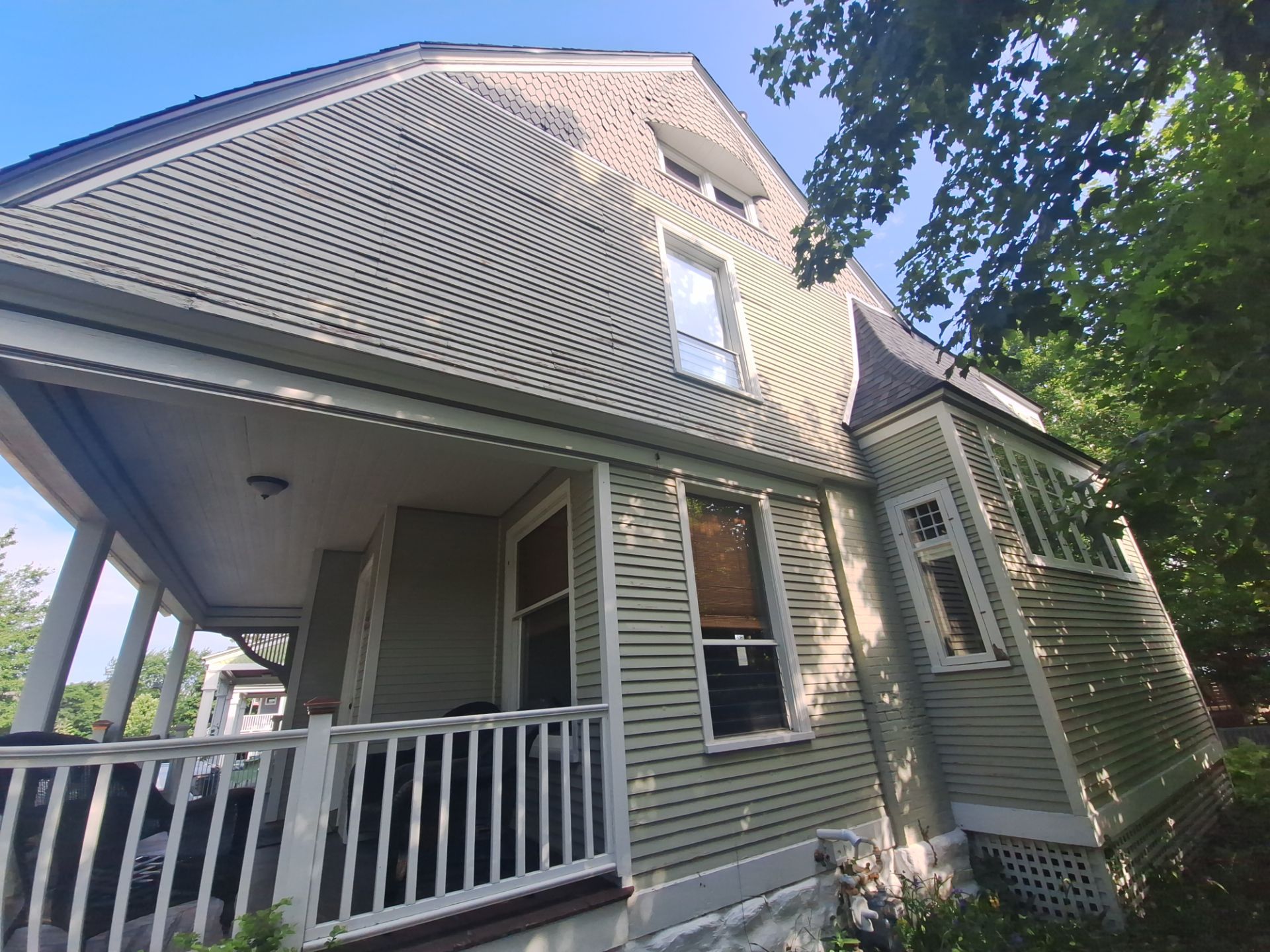 Exterior Home & Porch Refresh in Grand Haven, MI by Gordon Painting