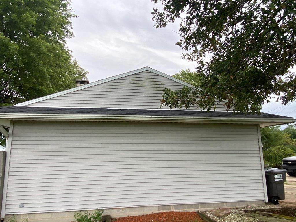 Storm damage roof replacement by Nitro Roofing and Construction