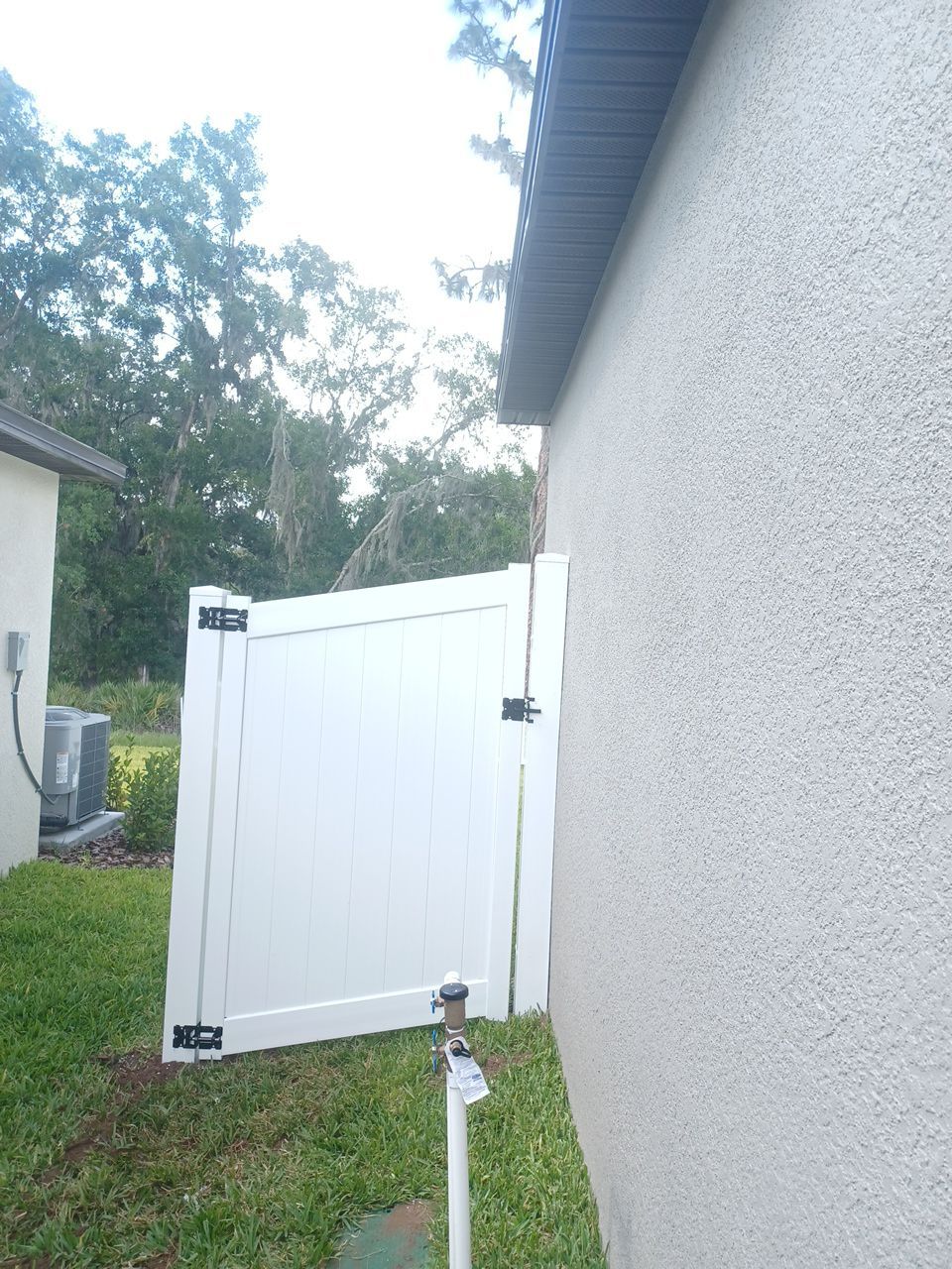 Riverview, FL 6ft. Tall White Vinyl Privacy with 4ft. Tall White Vinyl Spaced Picket  by Asap fence and gates, LLC