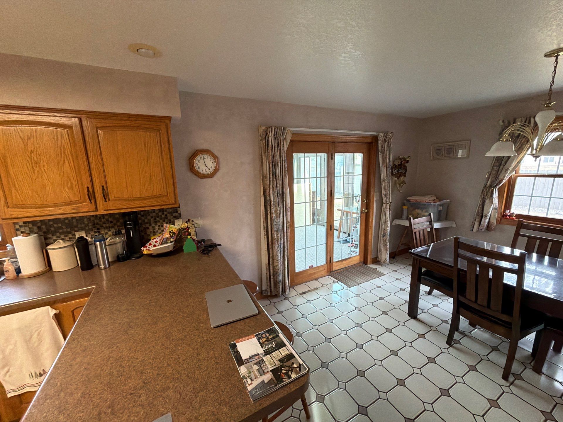 Kitchen Cabinet Painting and Hardware Update in Sioux Falls by Select Painting, Coatings & Garage Cabinets