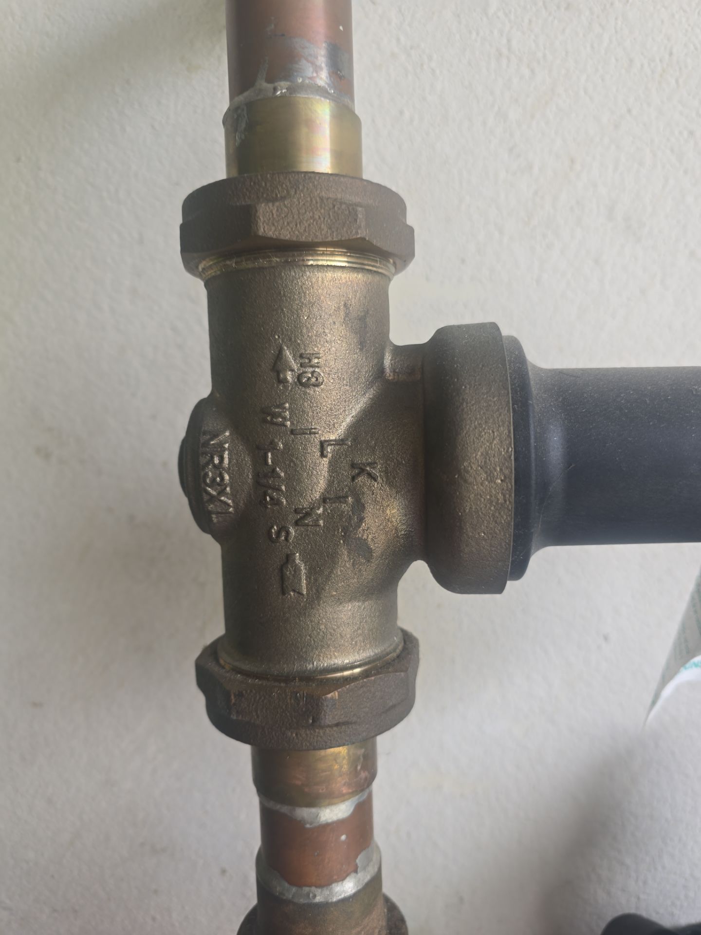 Fixing Water Leak by Us Plumbing