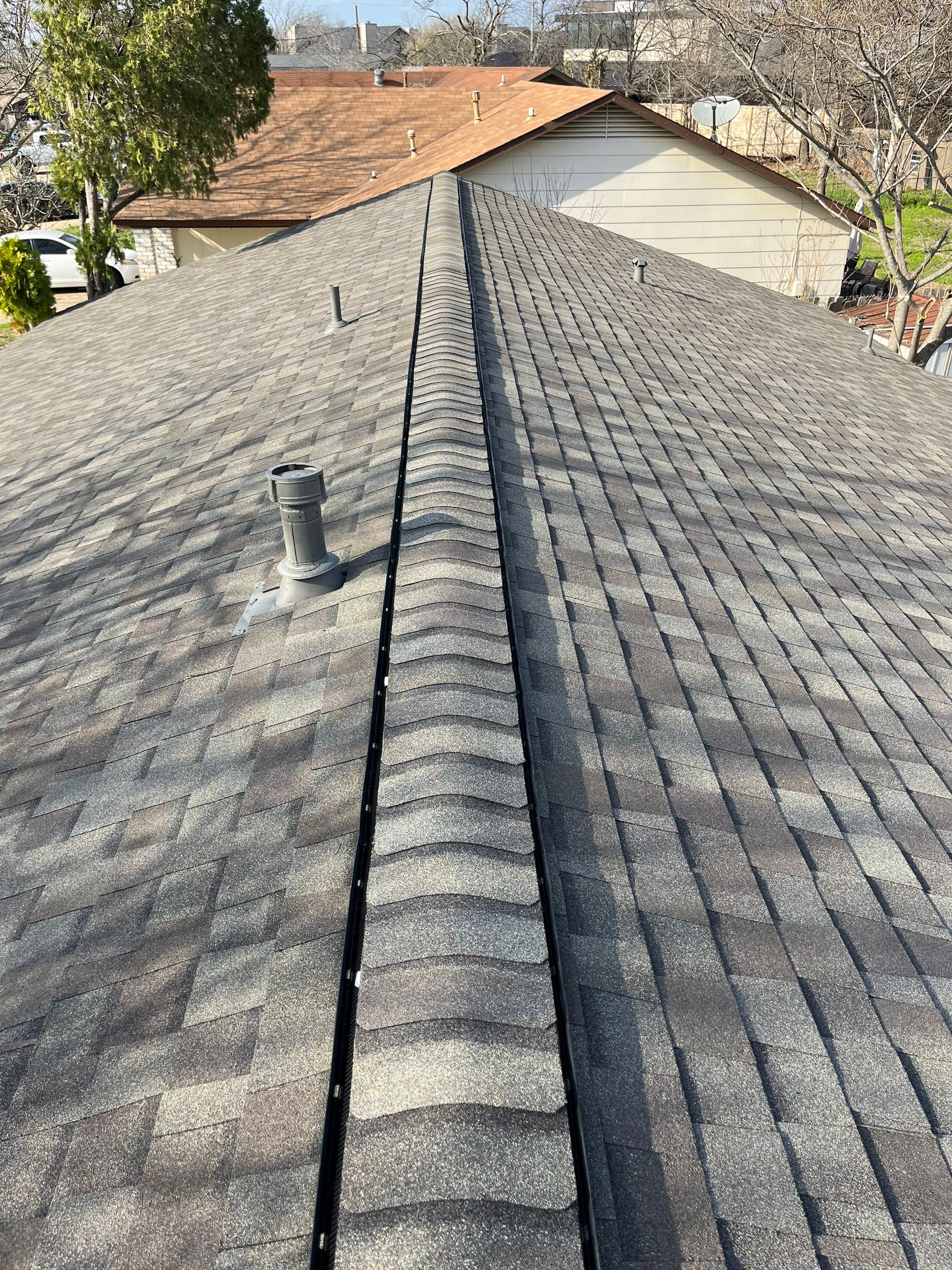 Estate Gray Shingles by Reimagine Roofing