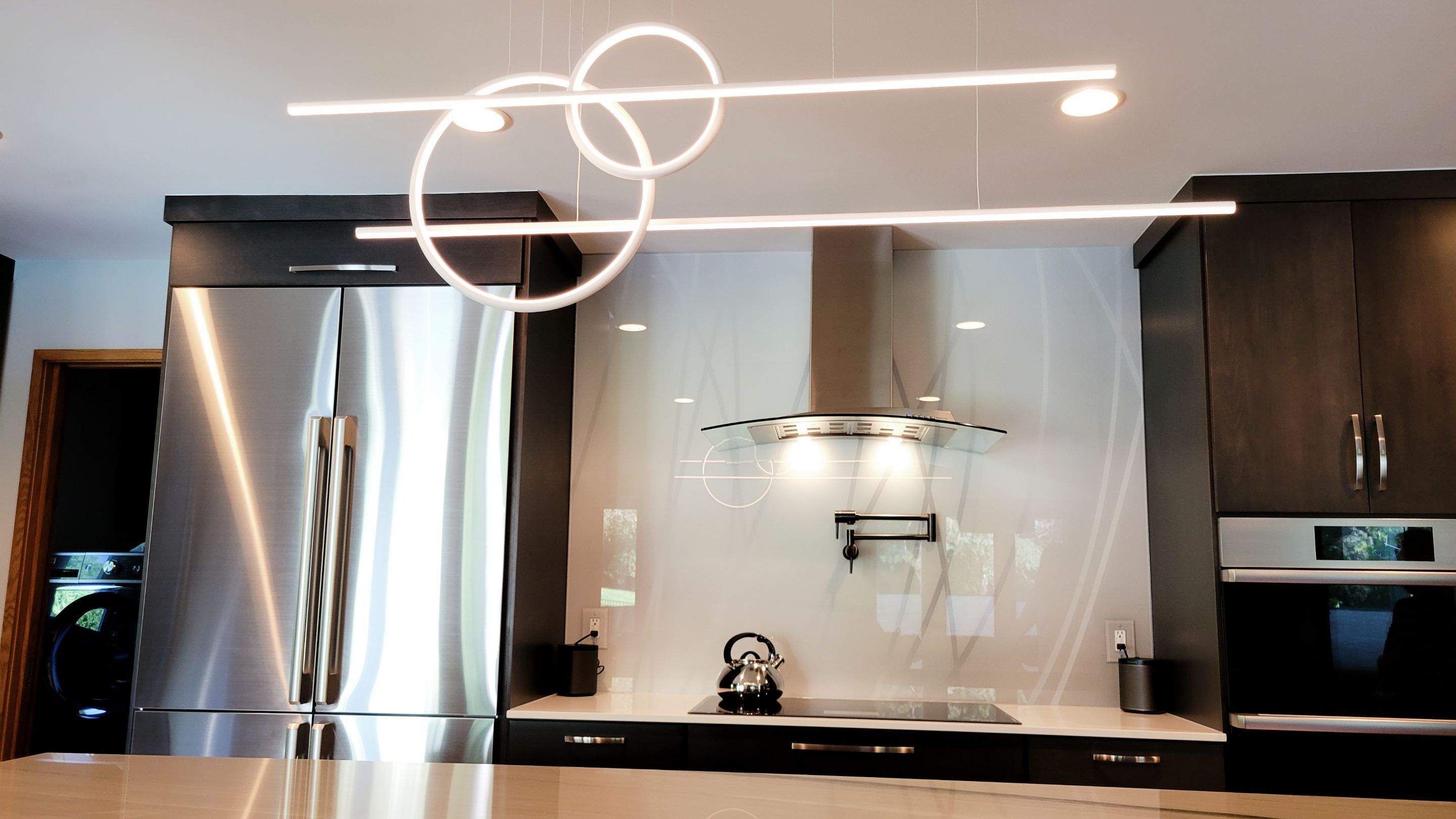 Kitchen Remodel using IMAGIO Misty Curves Solid Glass Backsplash by IMAGIO