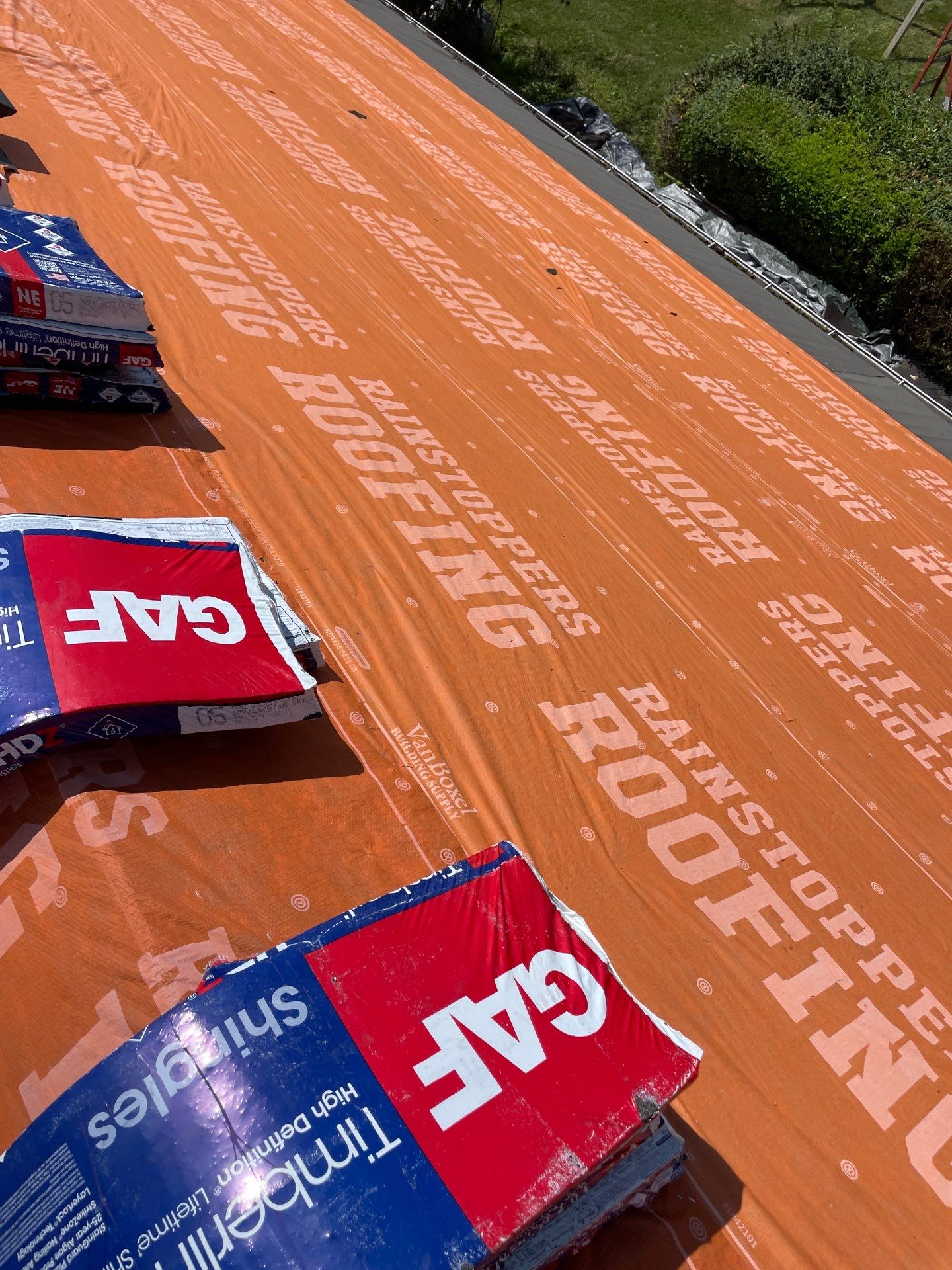 Residential Roofing Installation using GAF Timberline HDZ Charcoal by Rainstoppers Roofing