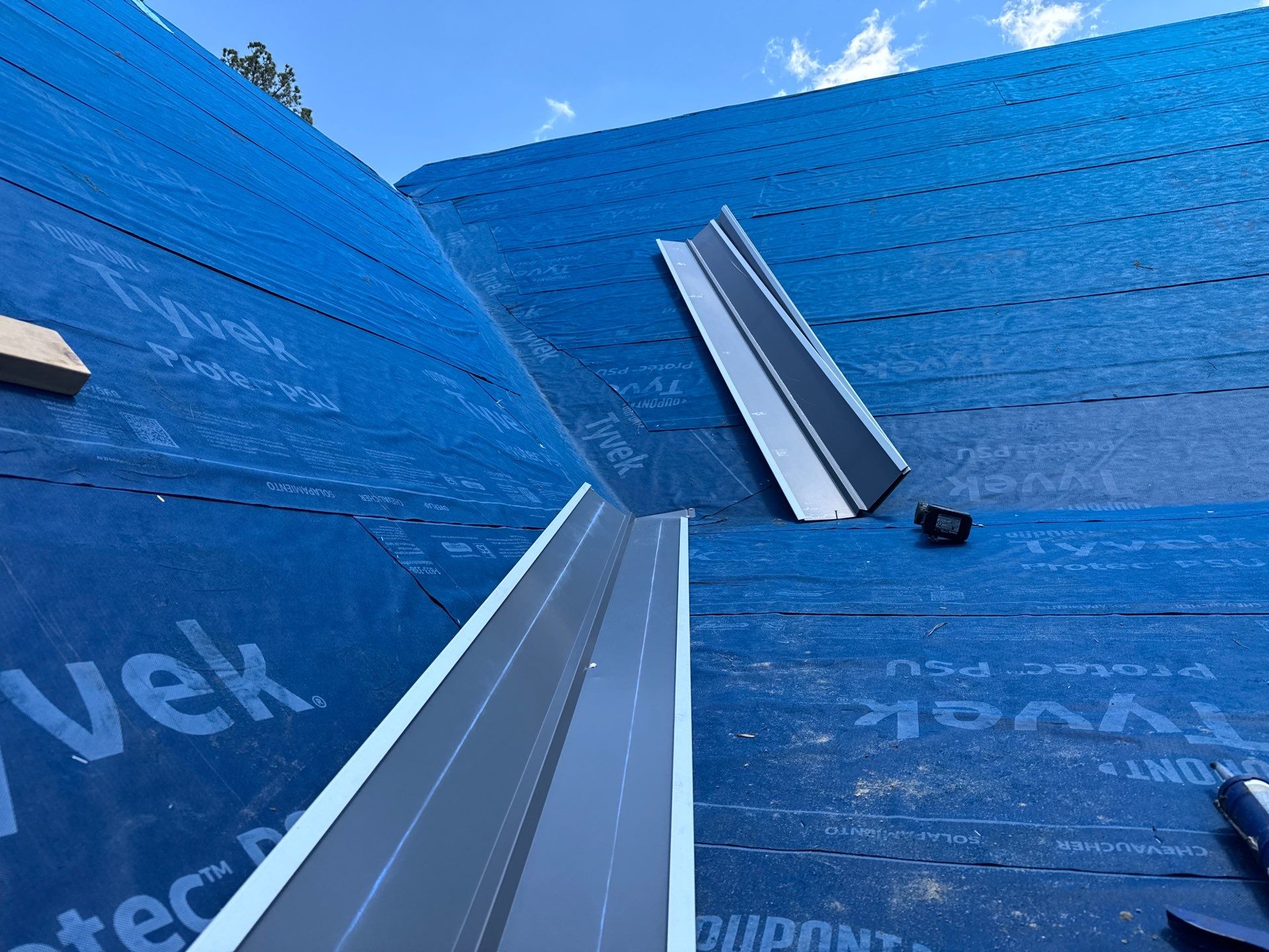 Custom New Construction Home Featuring Standing Seam Metal Roofing in Port Haywood by Cade Construction