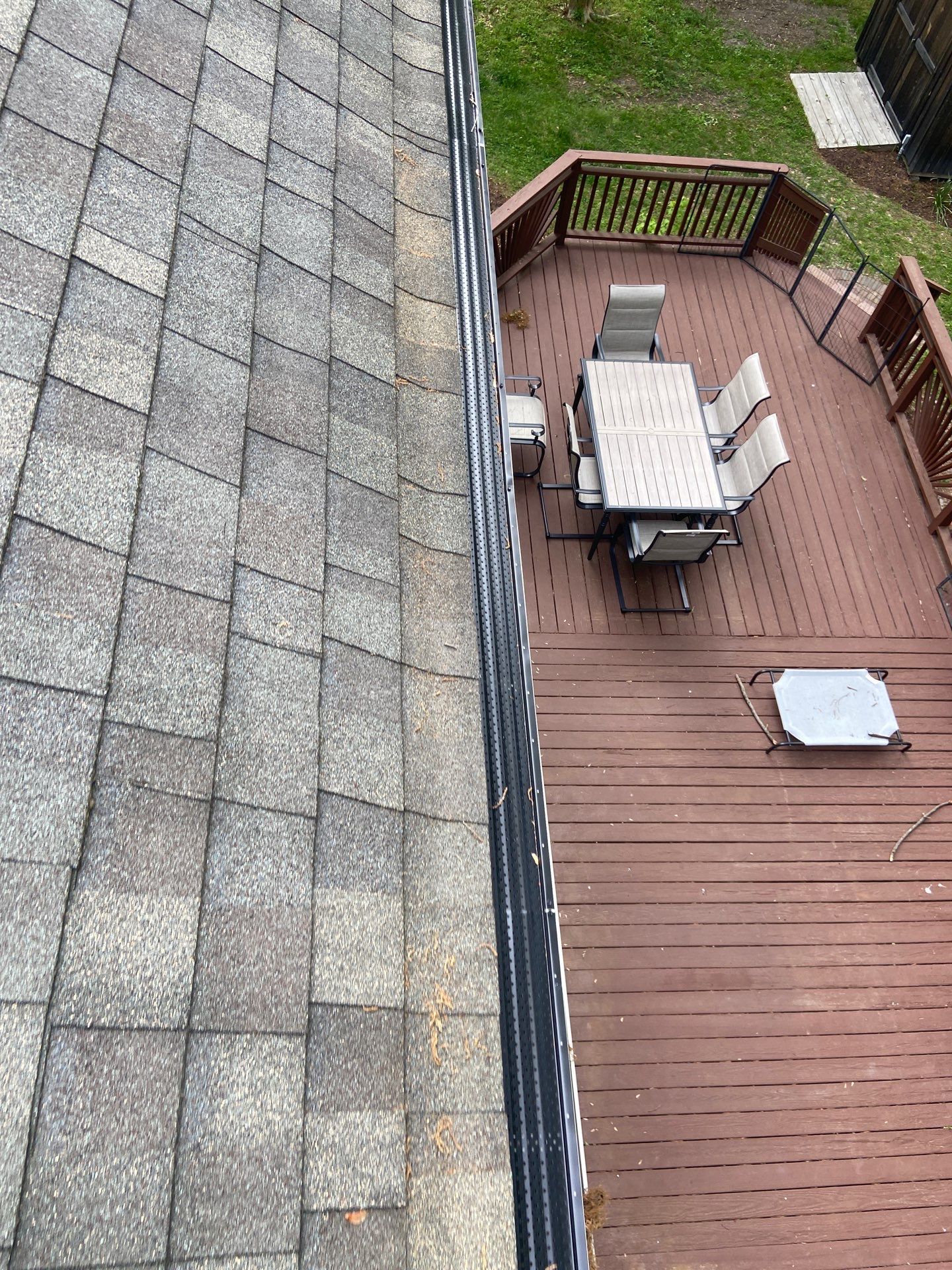Gutter Installation using Black Gutter Guards  by Storm Ready Exteriors
