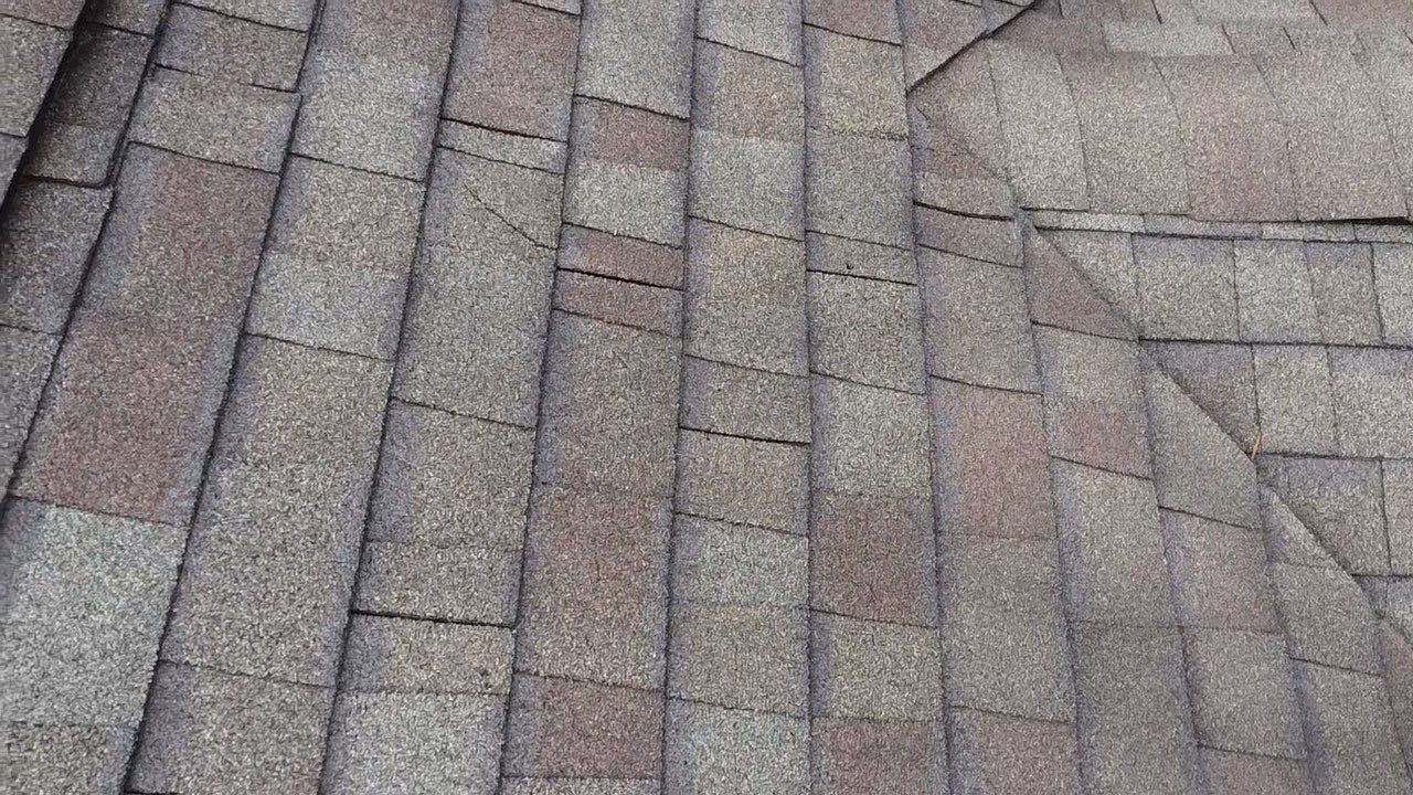 Metal Slate Shingle Roof in Sturgis, Michigan – “Darth Vader Helmet” Home by 4Ever Metal Roofing