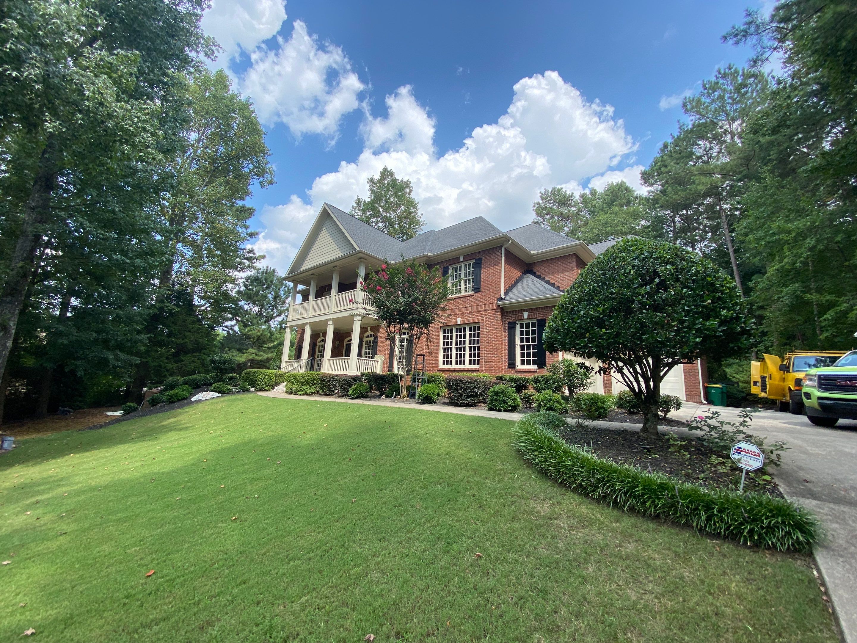 Exterior Trim and Garage Door Painting for Alpharetta Brick Home by Swift Home Renovations