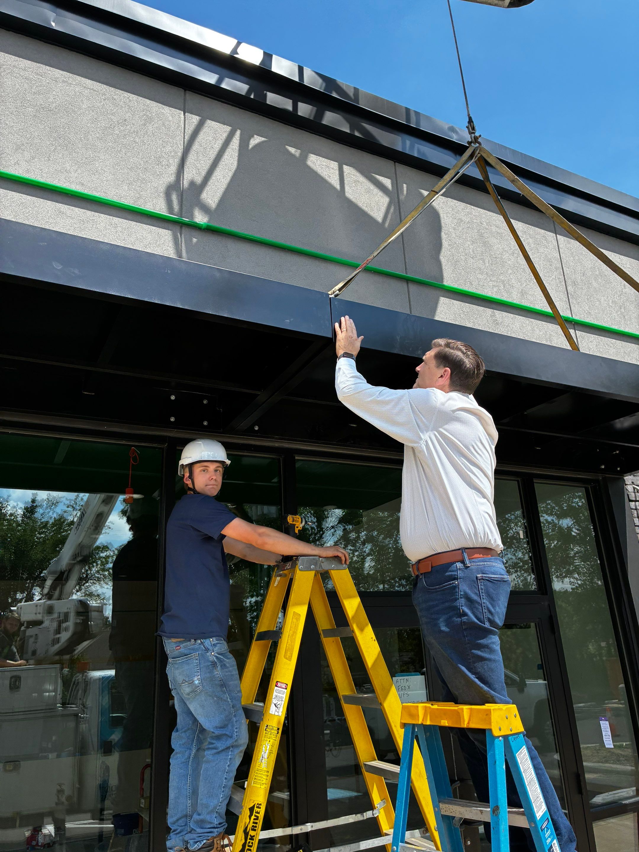 Subway Awning Installation in Granger by Hayes Design co