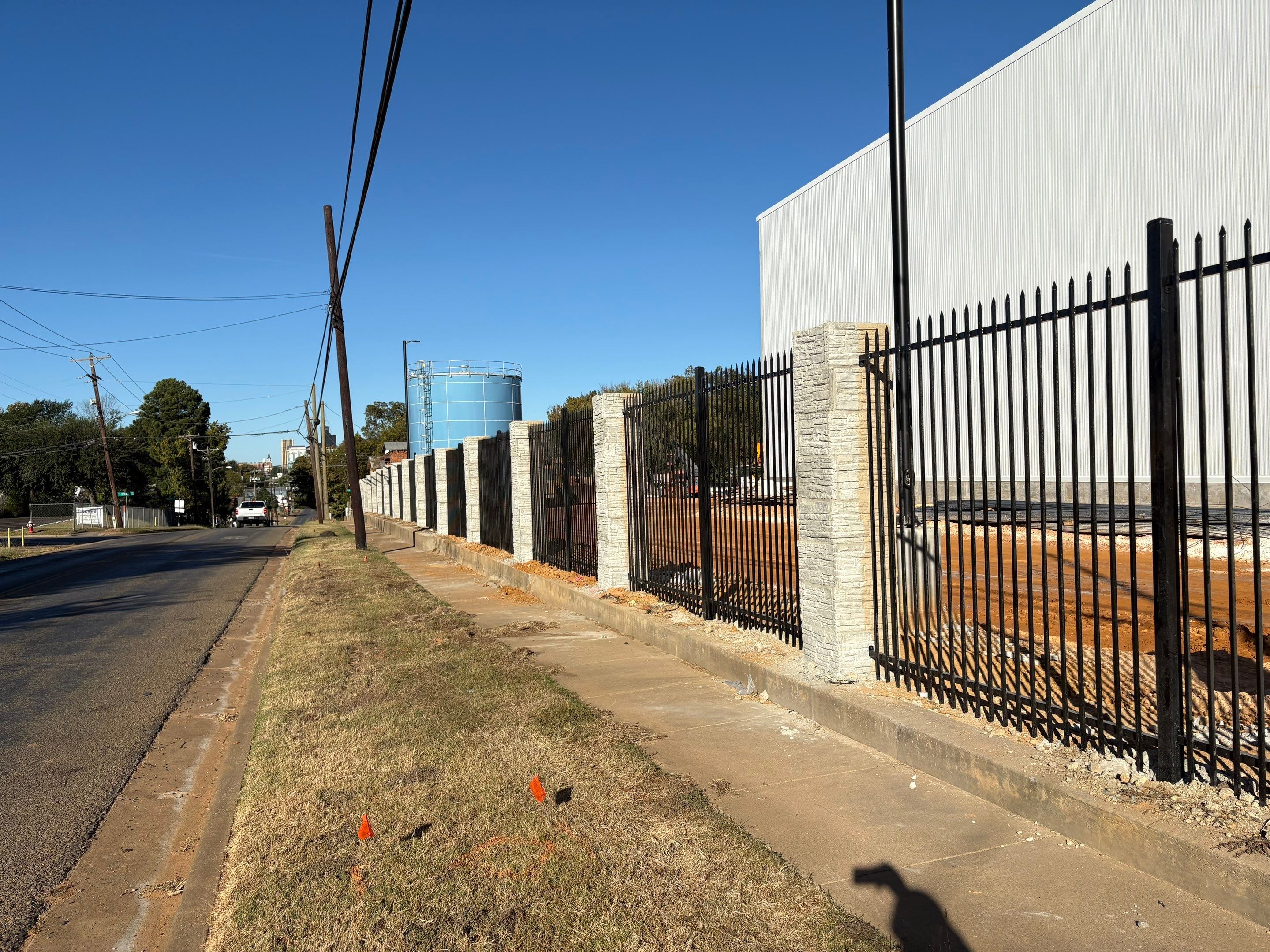 Commercial Fencing - Wrought Iron with Concrete columns by 3:16 Roofing and Construction