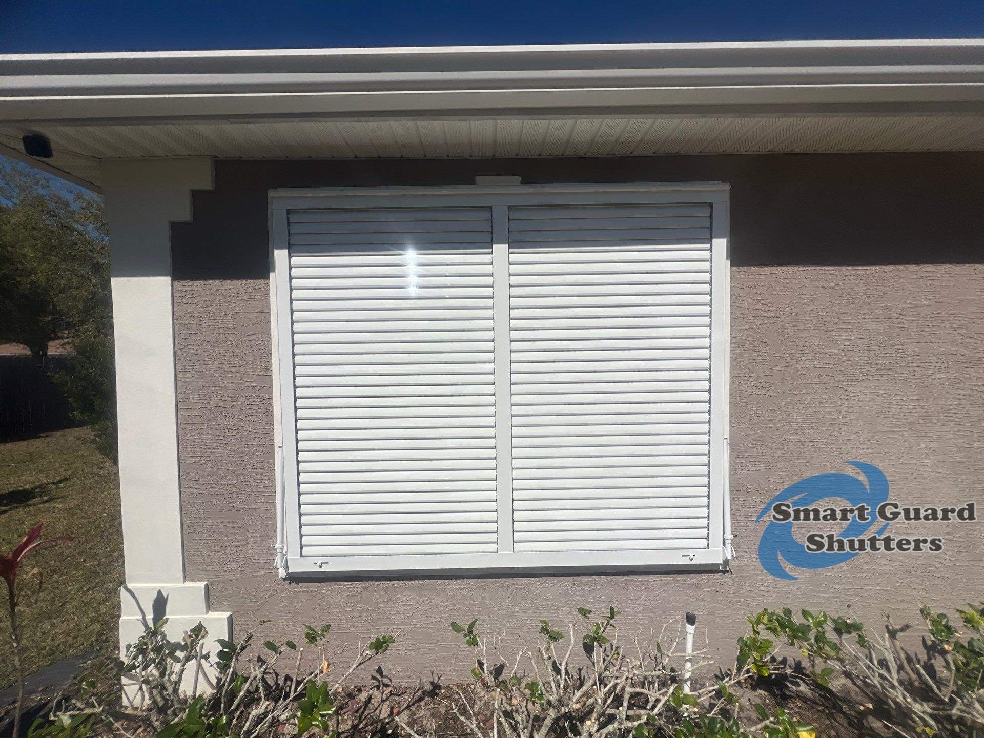 Impact Bahama in Signal White by Smart Guard Shutters