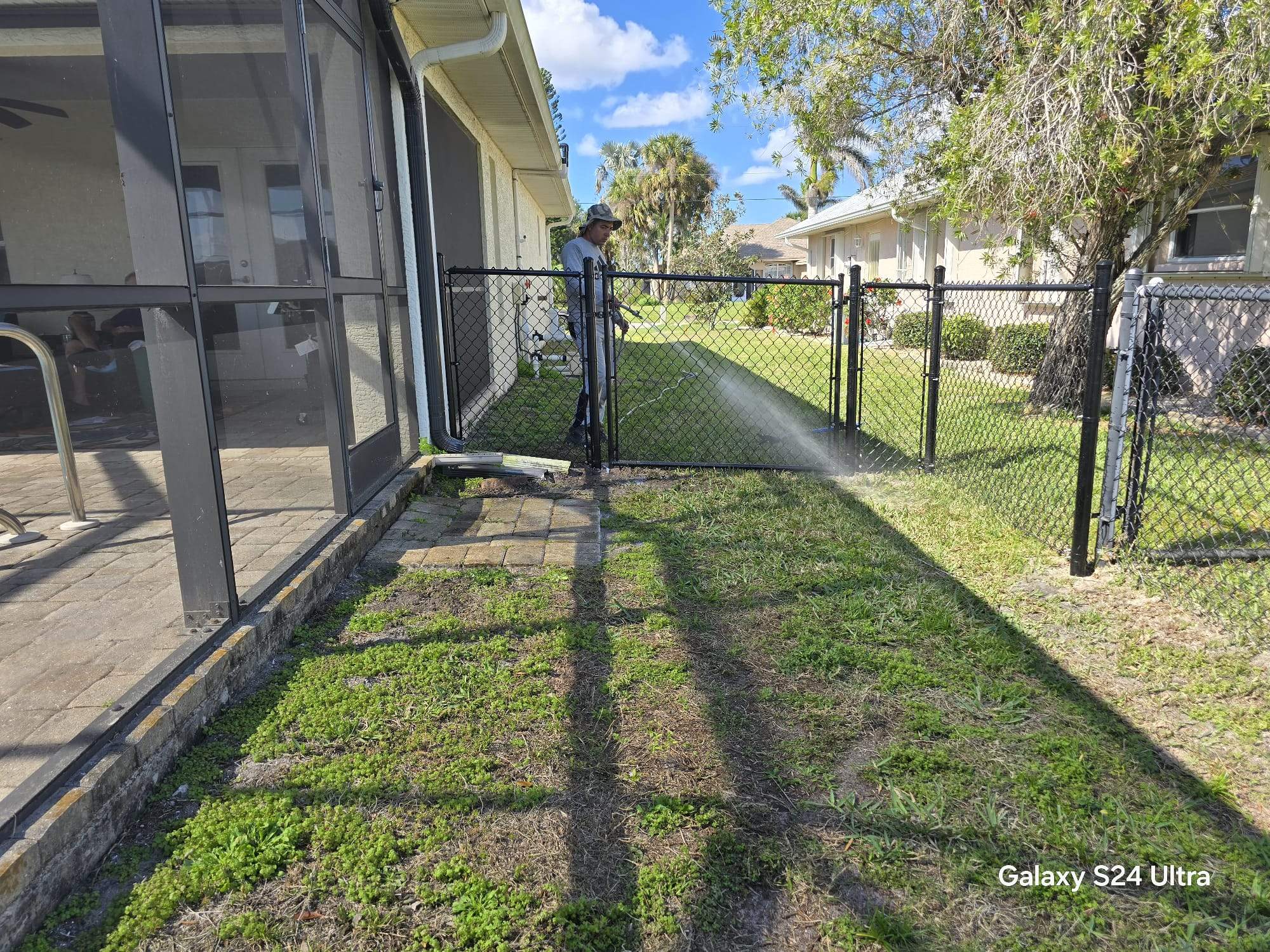 Waterfront Black Chain Link Fence Installation in Rotonda West by True Fence LLC