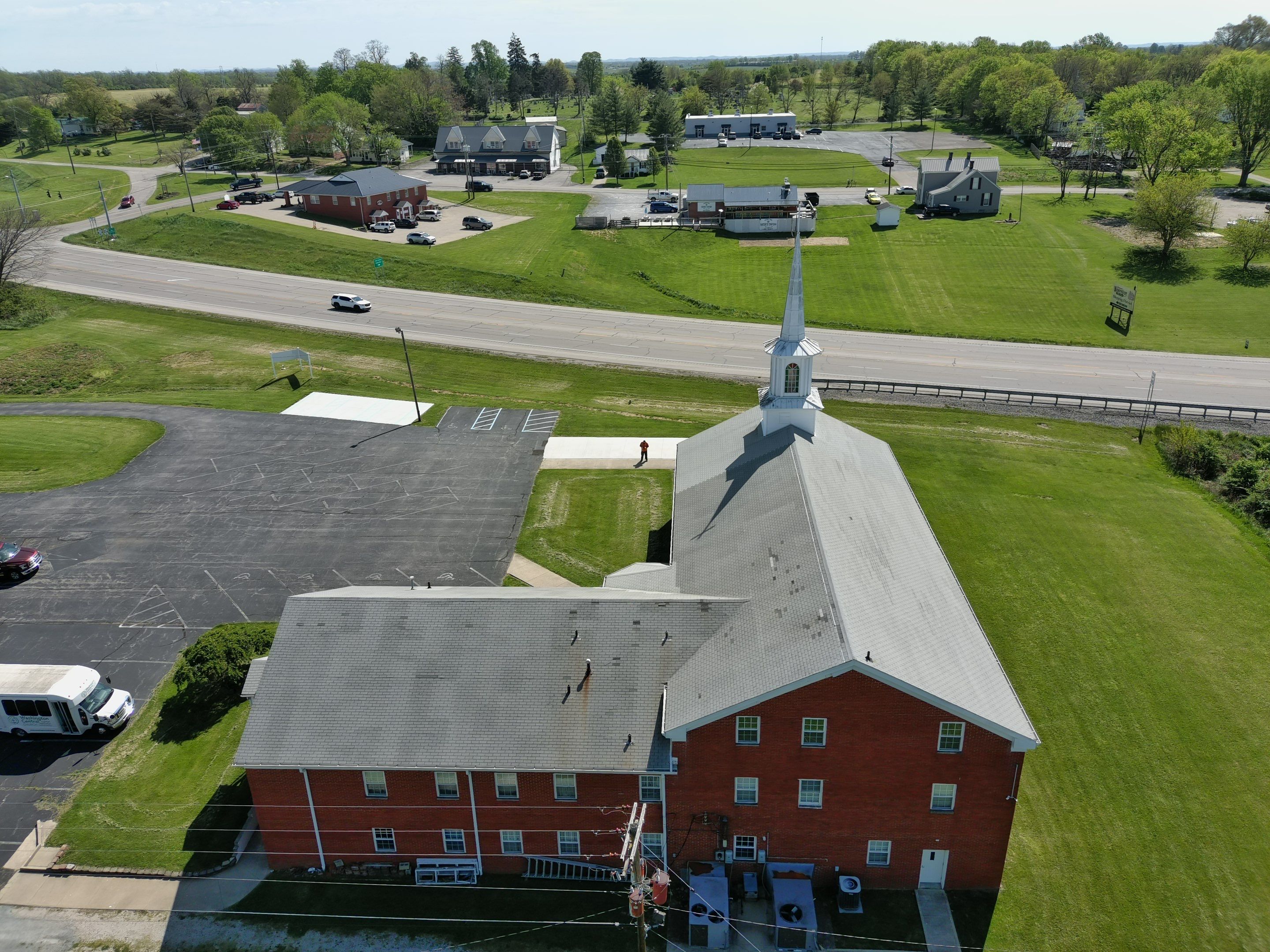 Commercial Roofing Installation using Performance Shingles by Mr. Roofer