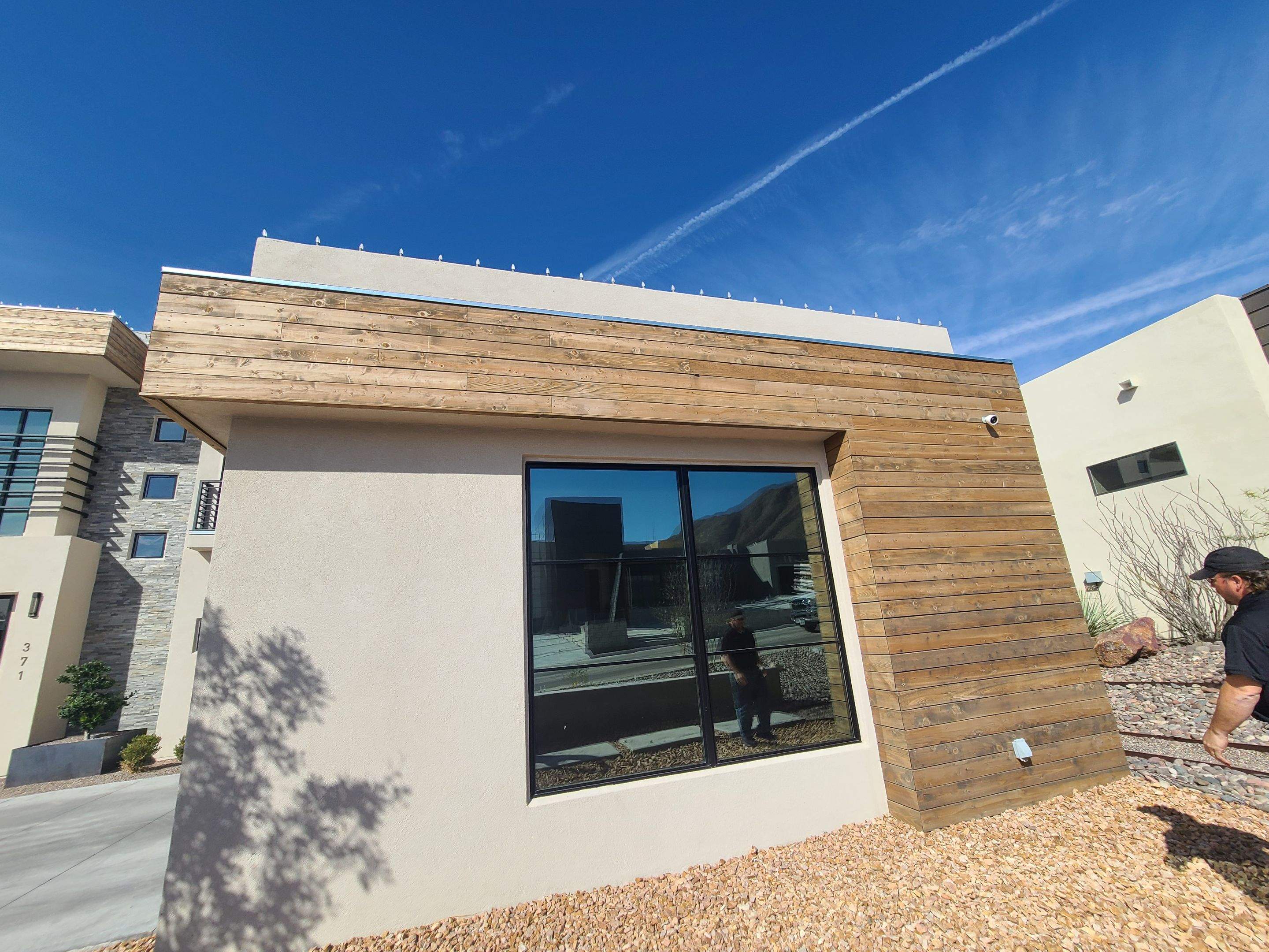 Exterior Wood Staining and Composite Decking Installation by Regal Renovate
