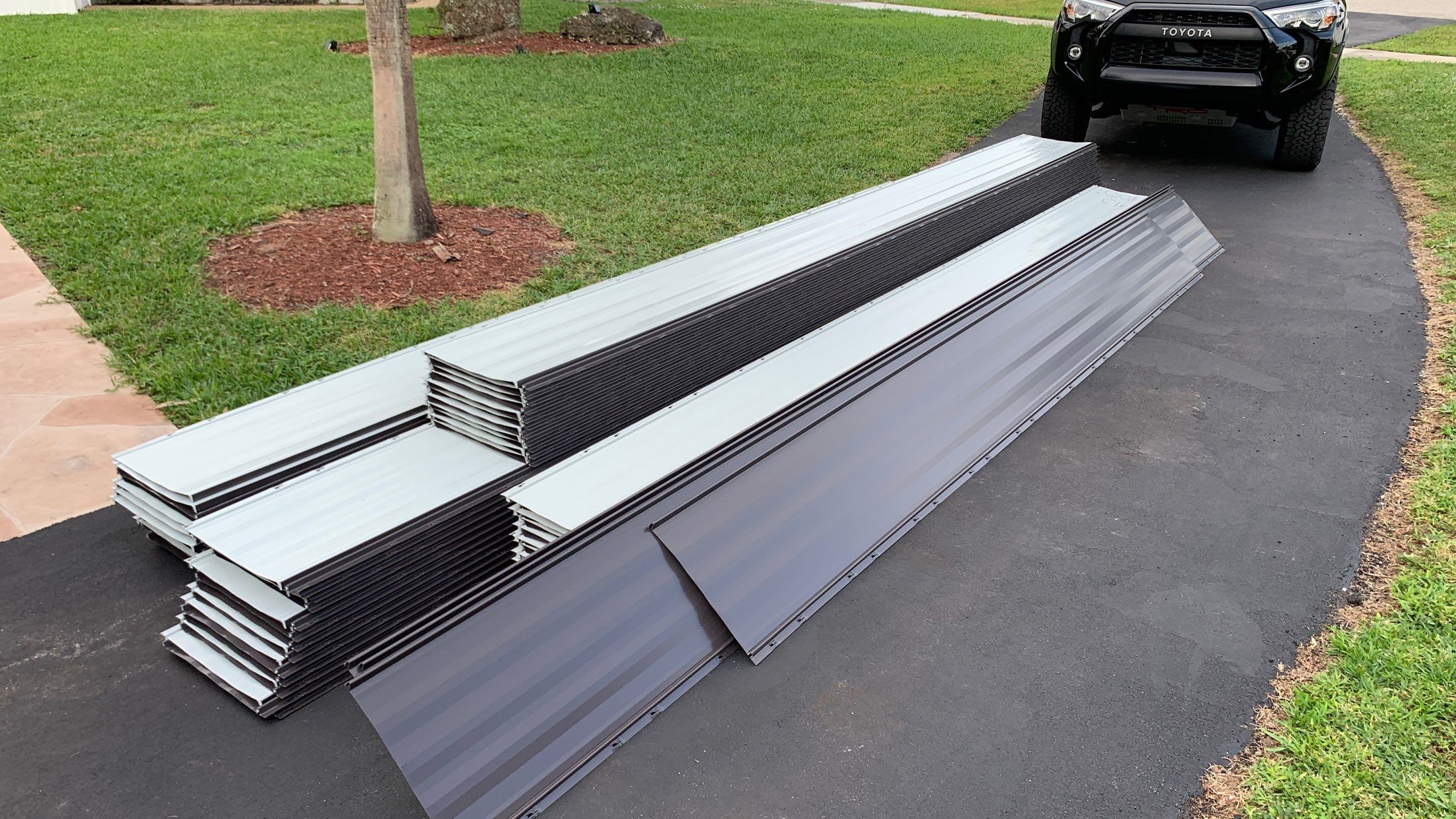 Residential Roofing Installation using 1" Nail strip metal roof by BLUES BROTHERS ROOFING