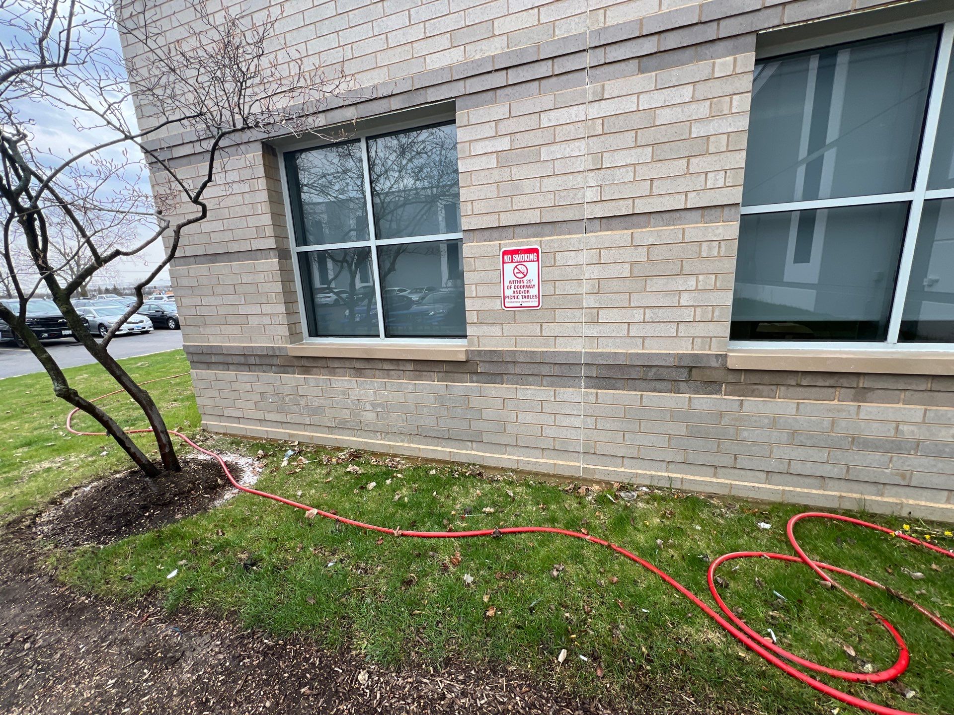 Commercial Facade cleaning using Algaecide, soft wash soap by Northern Power Washing LLC.
