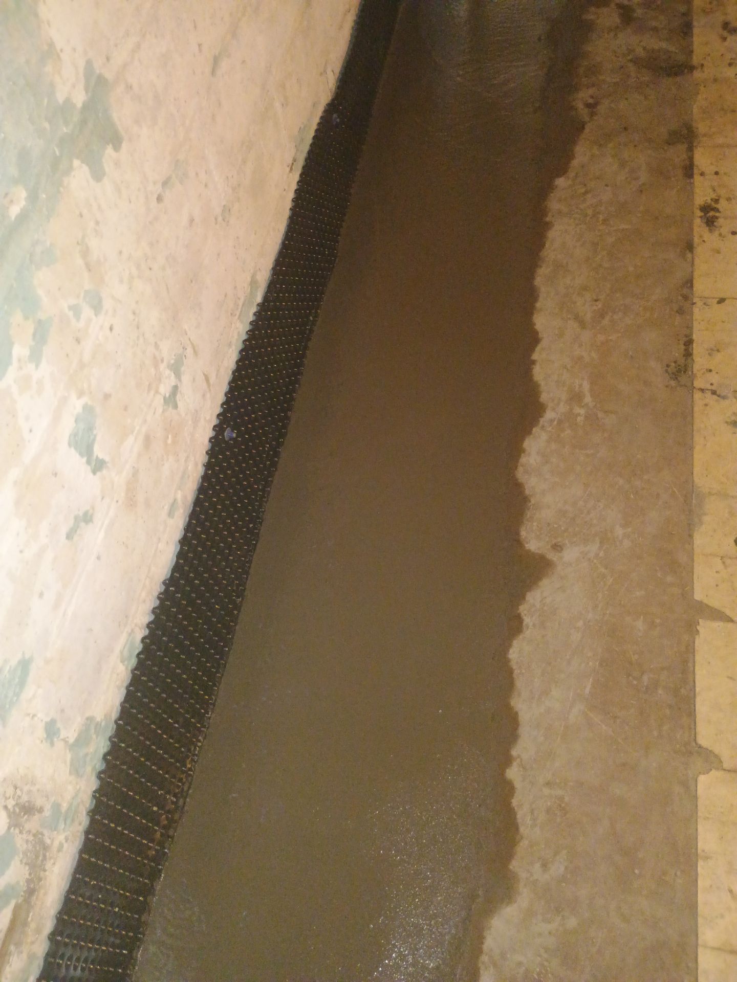 Interior Drain Tile for a South Minneapolis Basement by Waterproofing Northeast