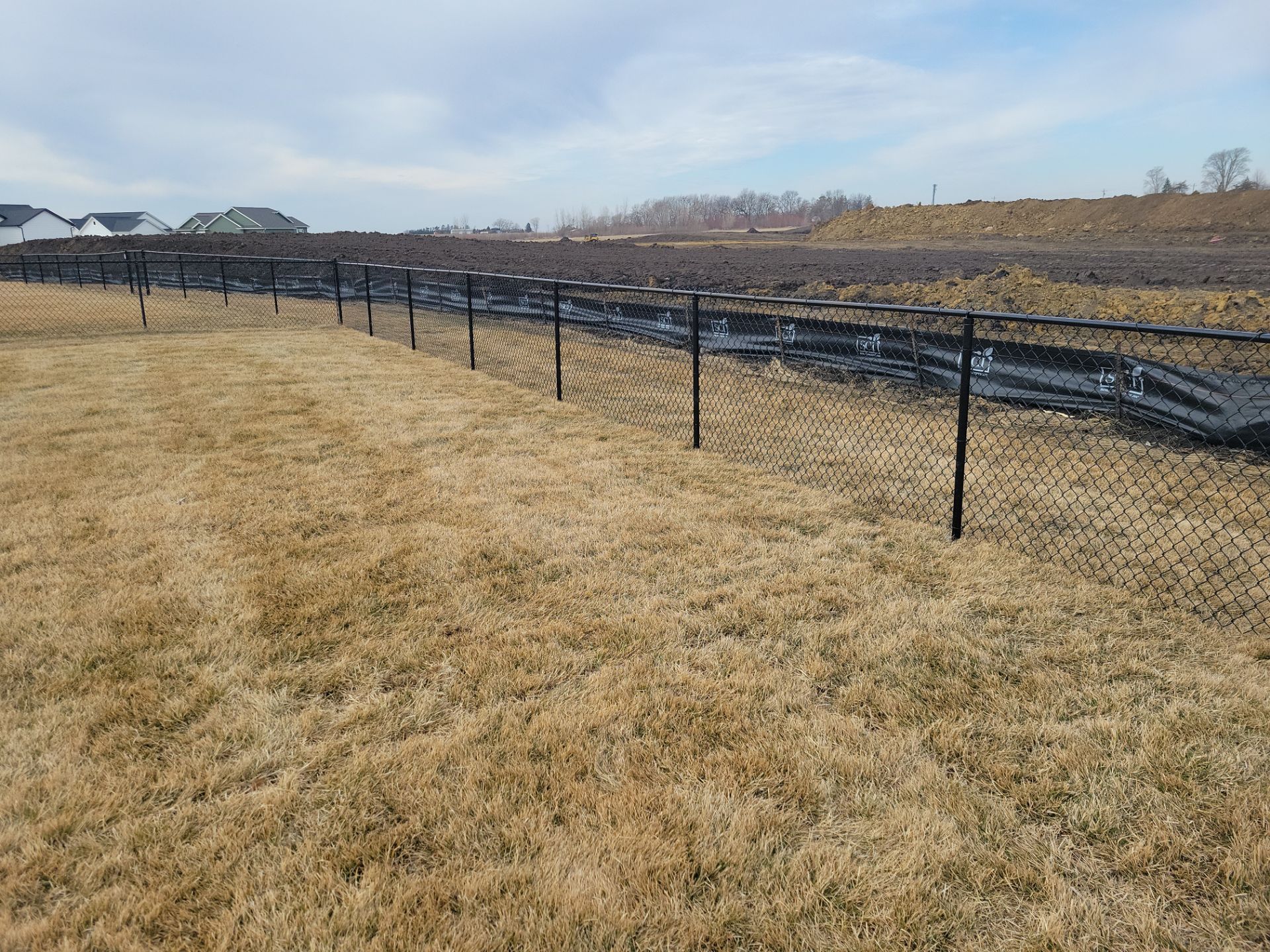 Black Chain Link Fence and Gate Installation in Cedar Falls by Perfect Picket Fence and Stain