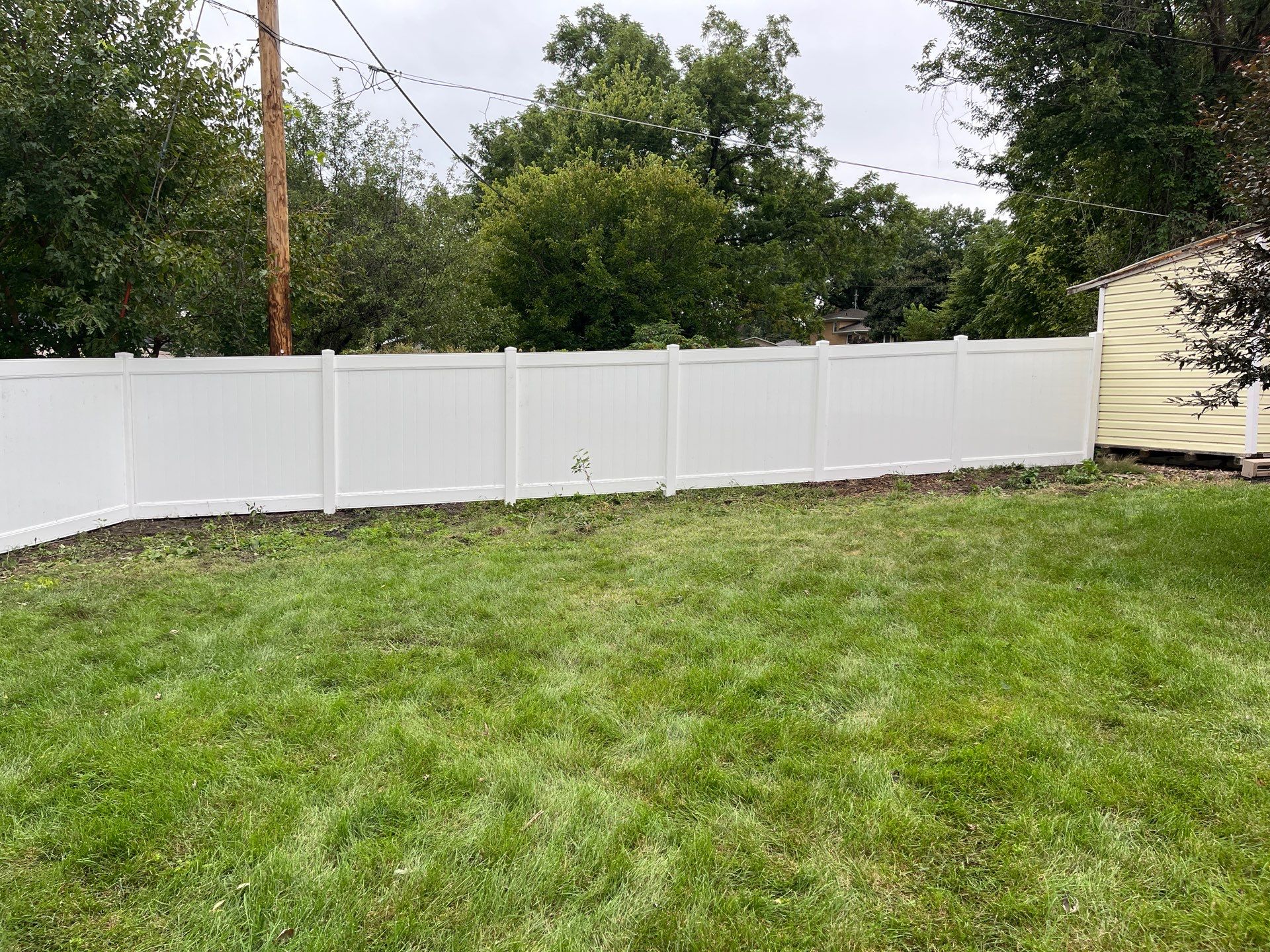 New White Vinyl Privacy Fence and Gate Installation in Waterloo by Perfect Picket Fence and Stain