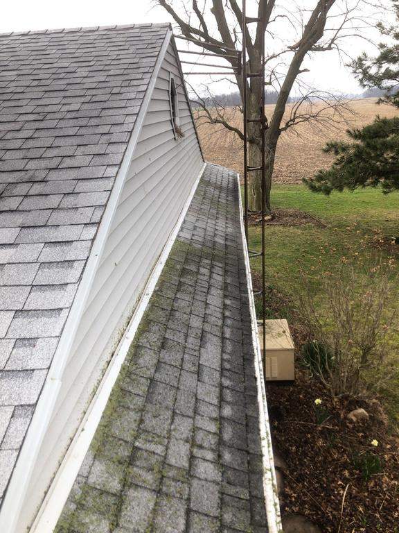 Storm damage roof replacement by Nitro Roofing and Construction
