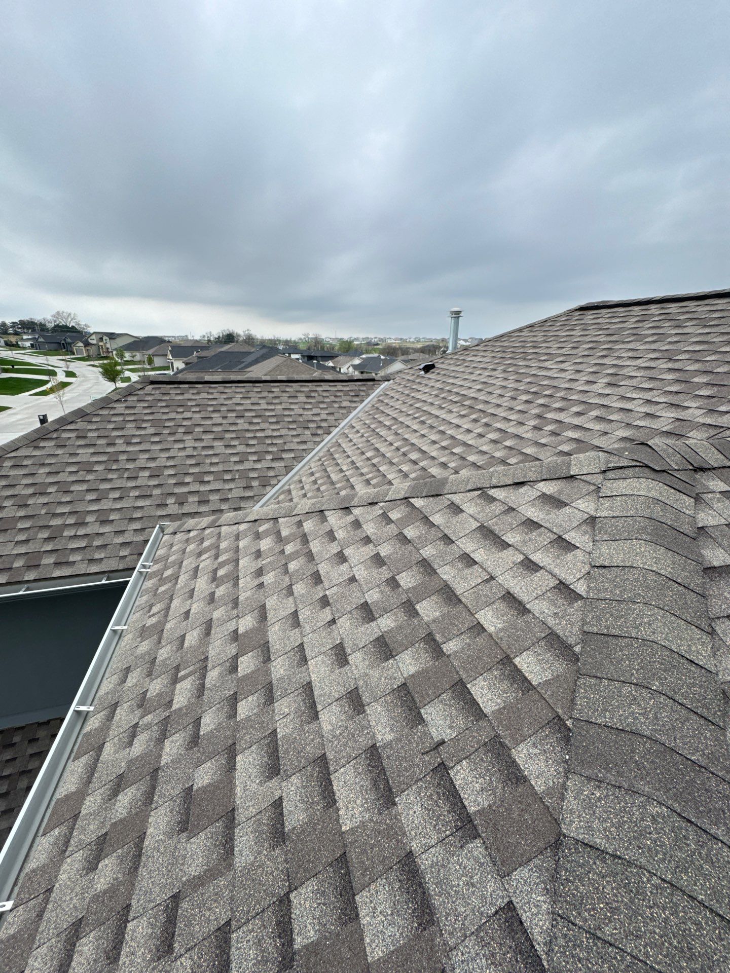 Residential Roof Restoration and Interior Ceiling Leak Repair in Omaha by Crows Roofing LLC