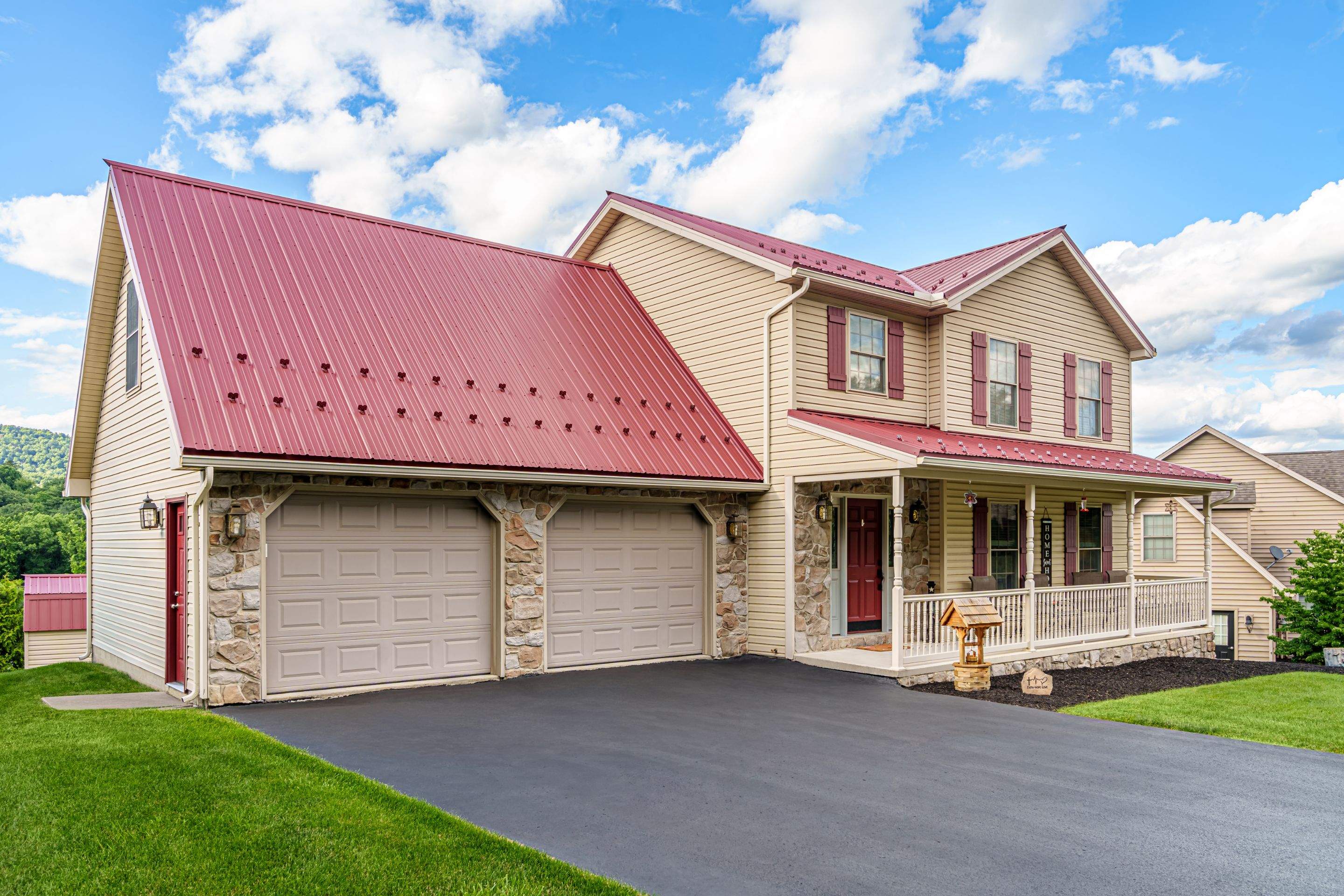 Metal roof-colonial red by Esh Builders