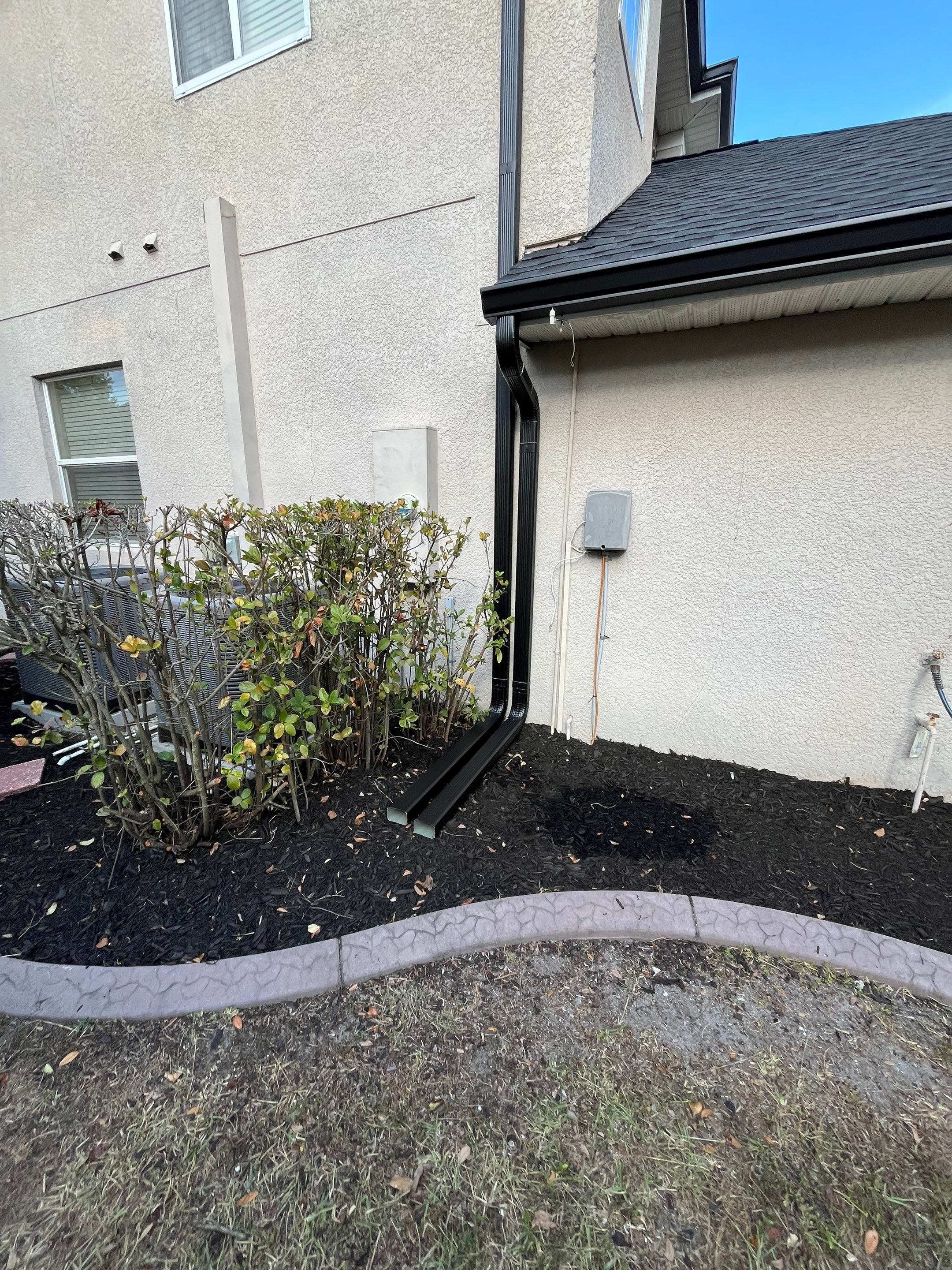 Black 6-inch Seamless Gutters for Modern Ellenton Homes FL by Gutter Professors