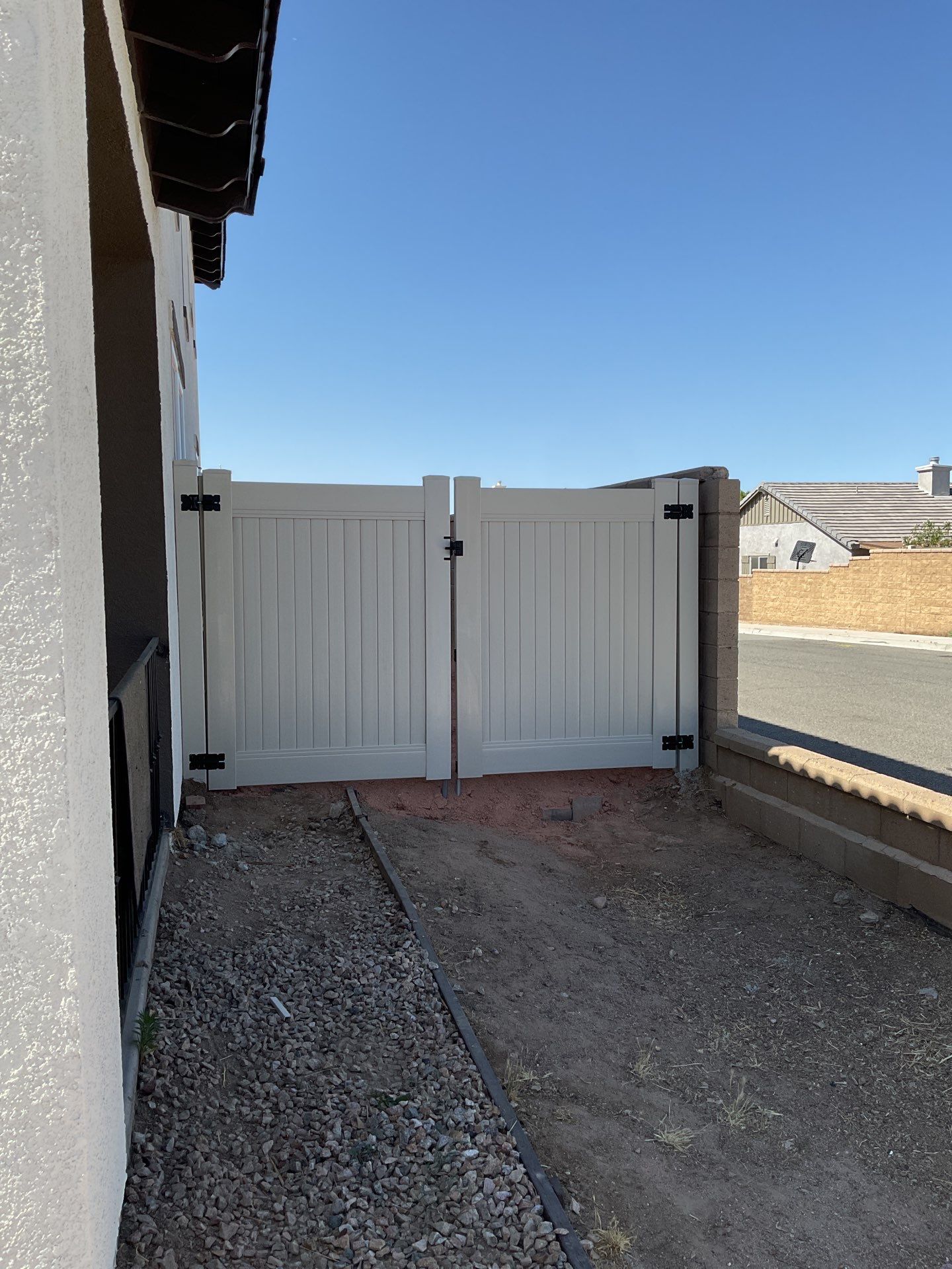 Gate installation using Vinyl by Fence Guys Inc.