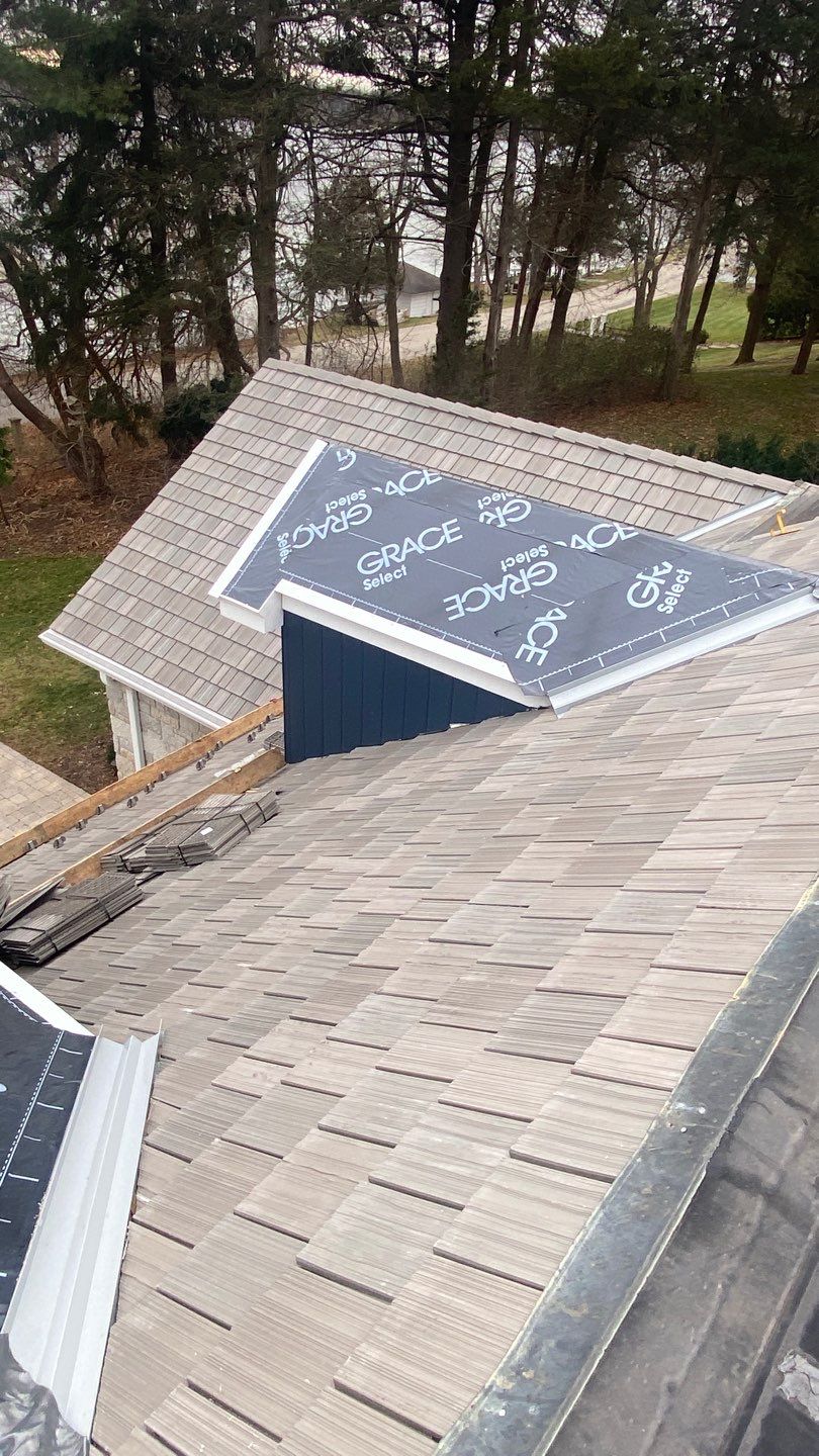 DaVinci Roof Installation with Snow Guards in Oconomowoc Lake by Custom Installations