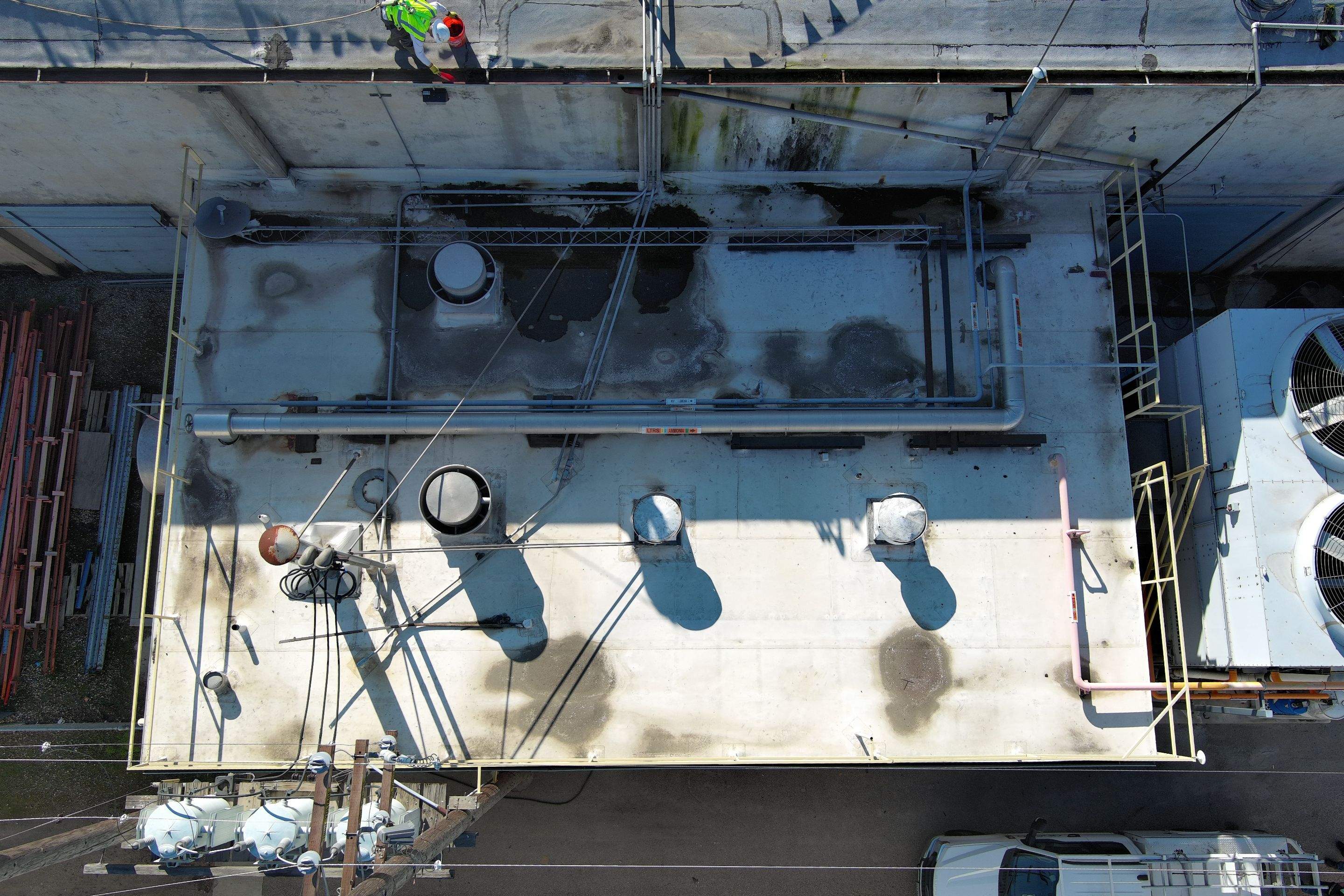 TPO single-ply roofing system using GAF Single-ply TPO 60 mil with 1.5 inch ISO board insulation by Straight Edge Roofing Inc