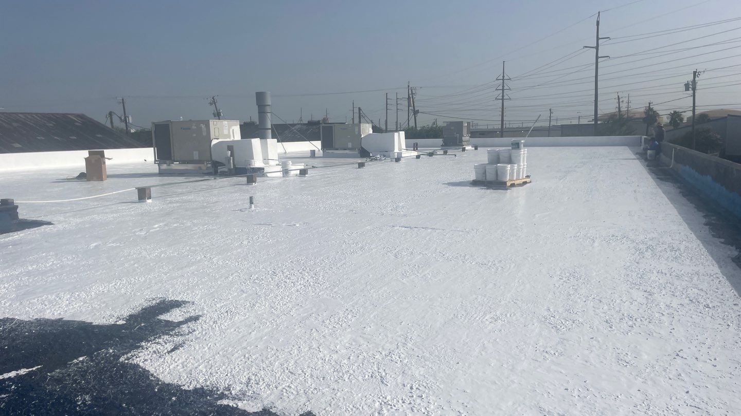 Dirty leaking Gravel Roof by Bayfront Roofing and Construction