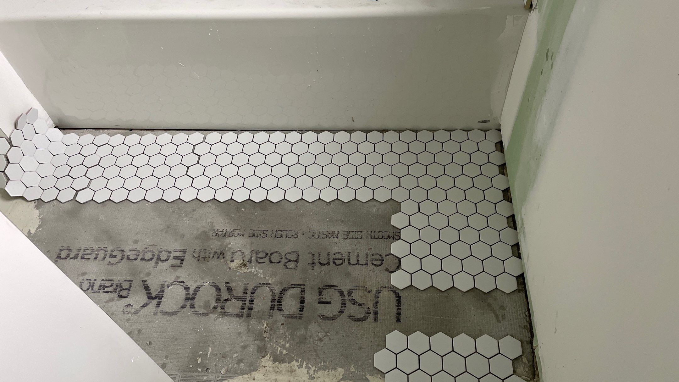 Remodeled Home with new tile floors, Showers and Refinished Oak Floors with stain and Waterbased Finish by Footprints Floors of Coastal Carolina