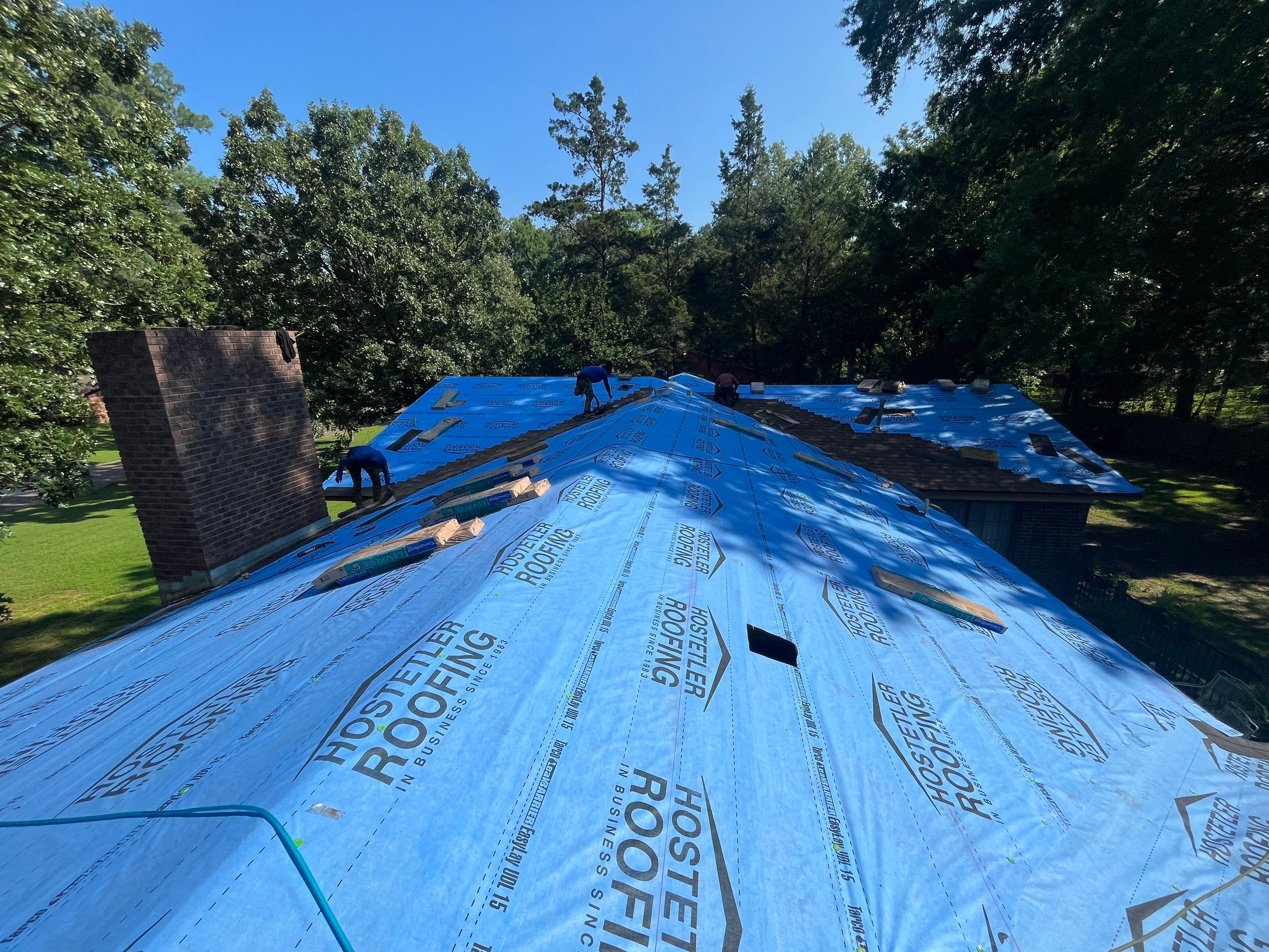 Storm Restoration Reroof: 25 Year 3-Tab Shingle by Hostetler Roofing