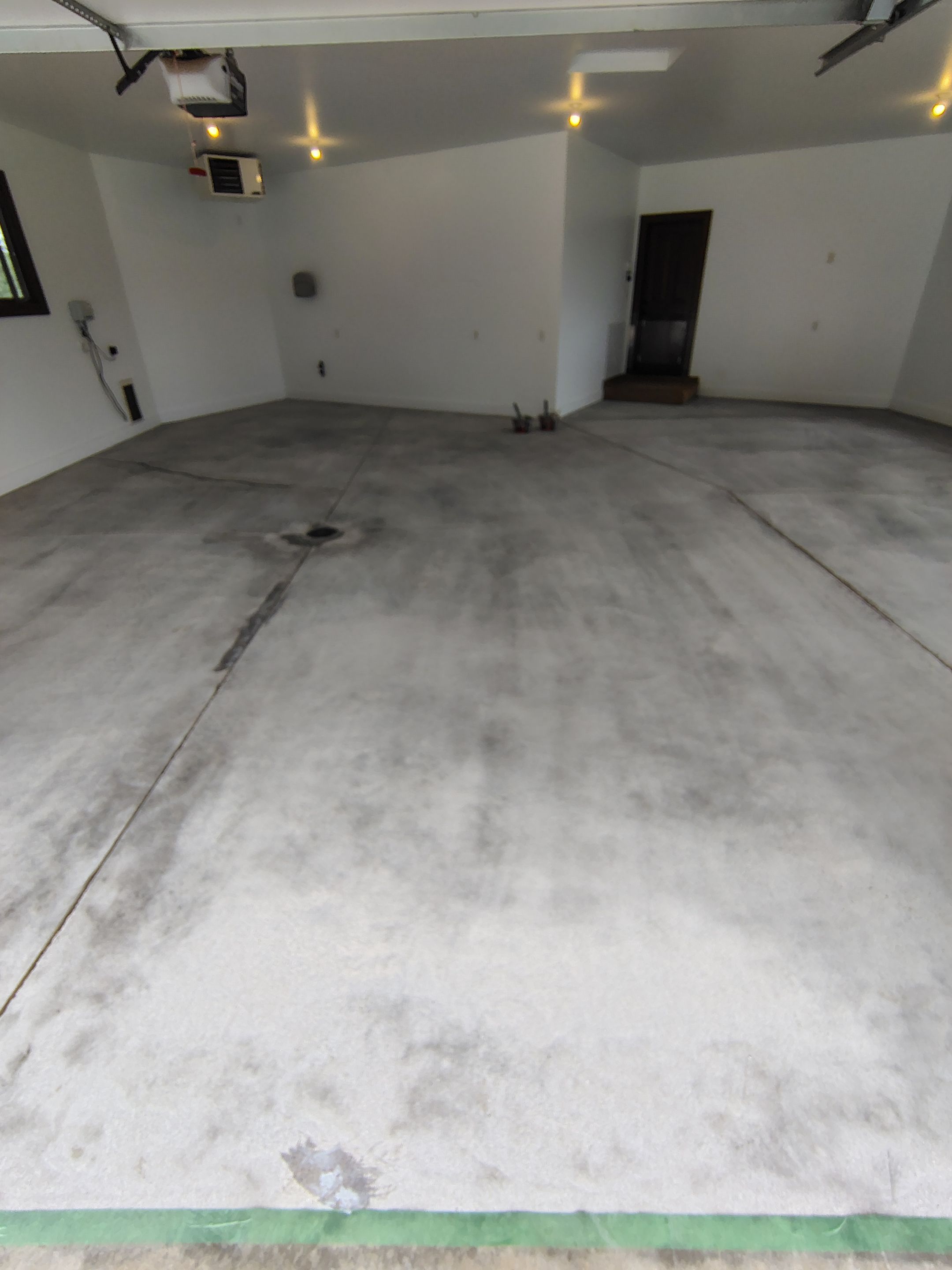 Feather Grey Floor Coating in Sioux Falls, SD by Select Painting, Coatings & Garage Cabinets
