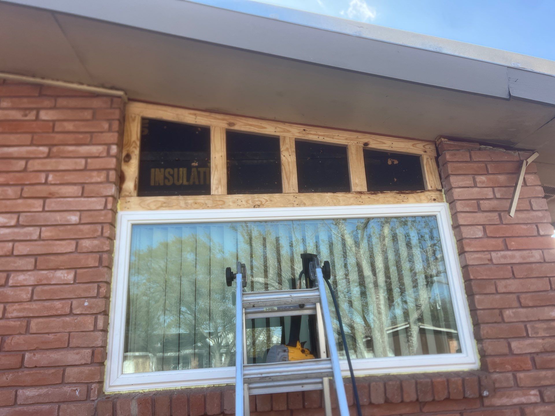 Windows in Brick with a Bay Window by Bayfront Roofing and Construction