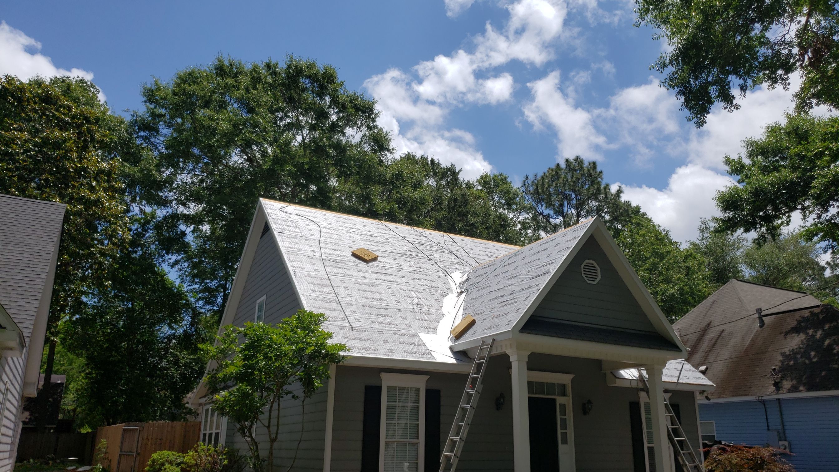 Residential Roofing Installation using Roof Replacement by American Roofing & Construction LLC