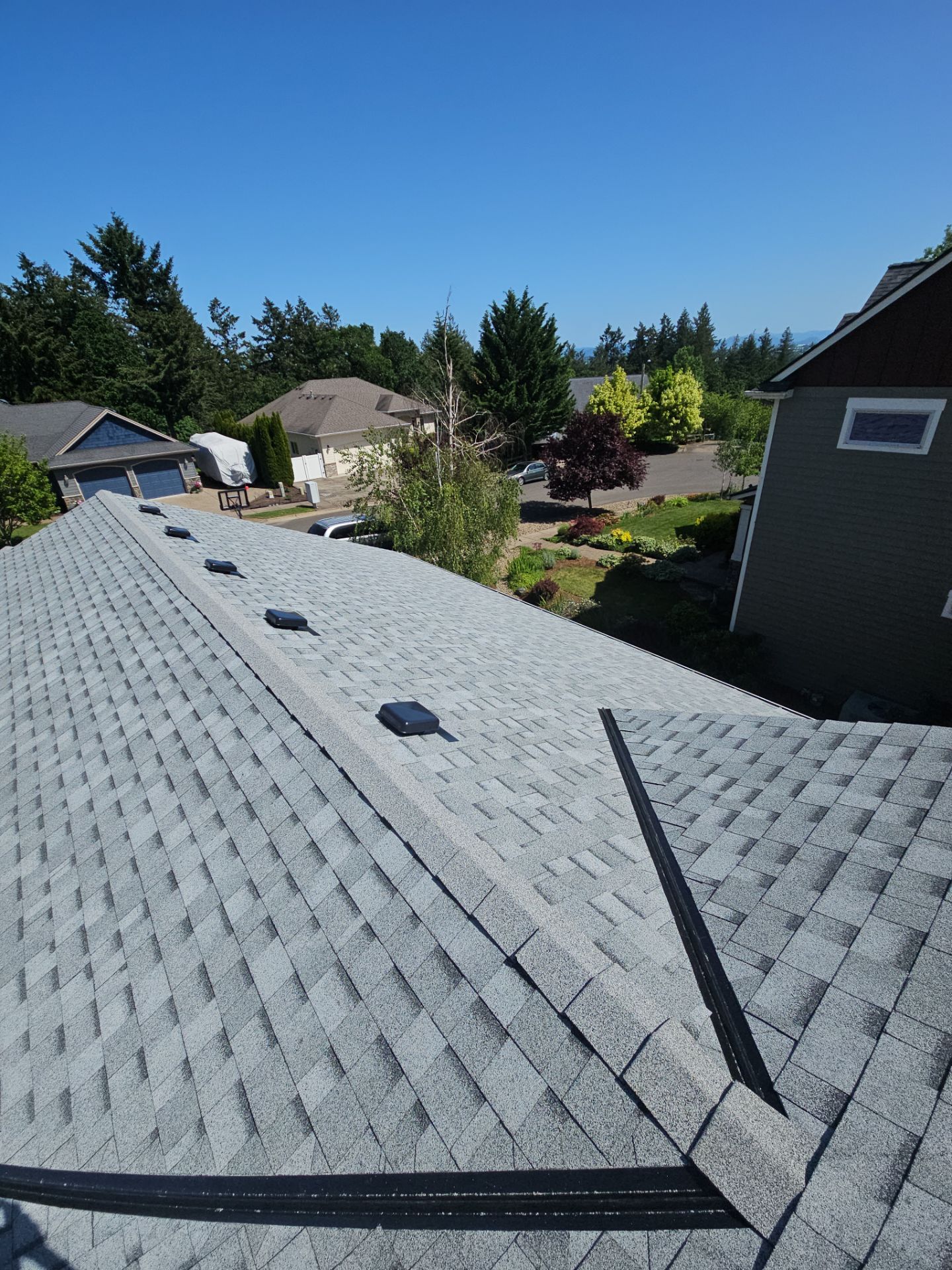 Residential Roofing Installation using IKO Cambridge (Color: Dual Grey) by Orezona Building & Roofing Company, Inc.