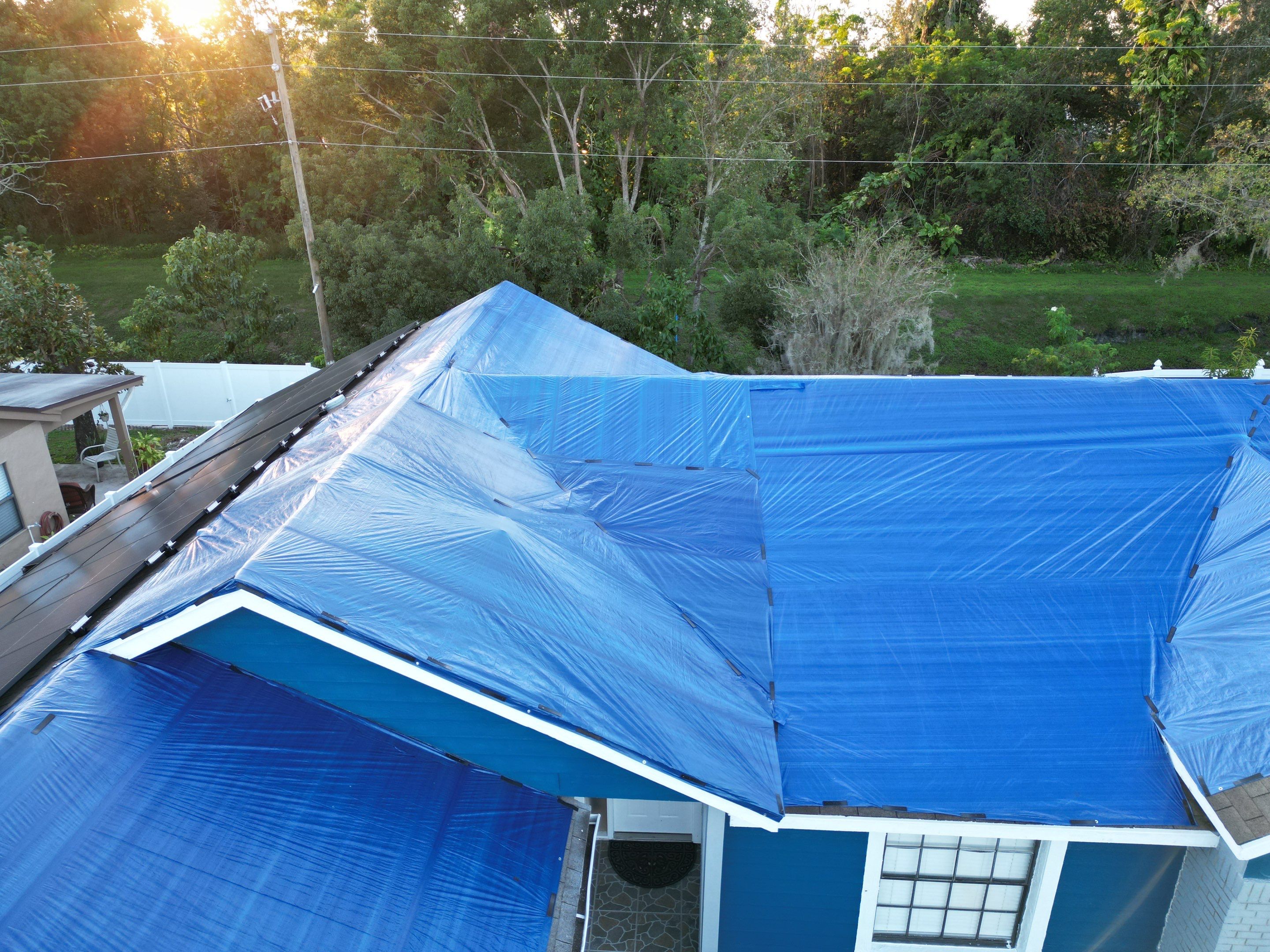 Tarp using TARP BLUE by AquaShield Restoration USA