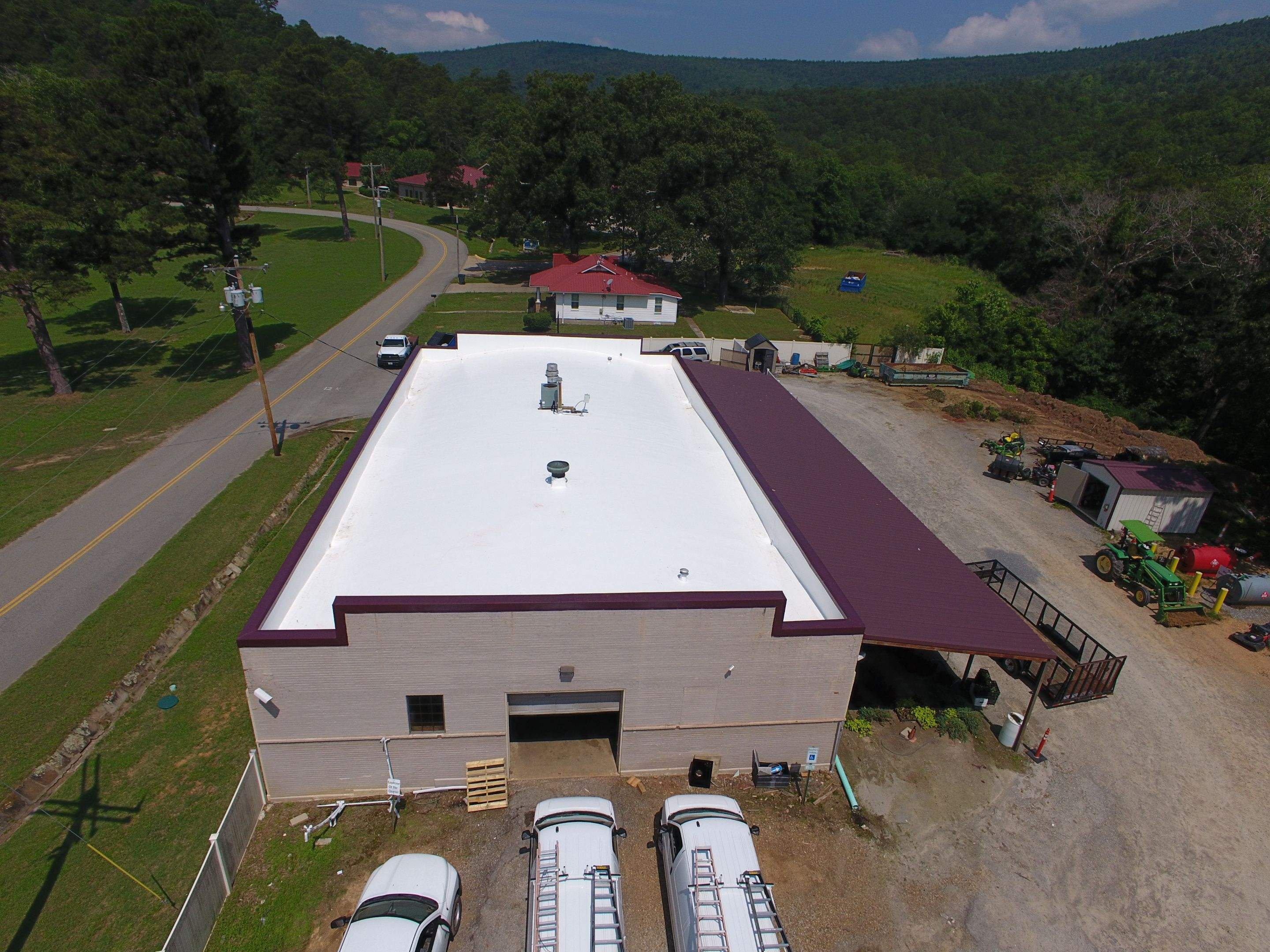 Choctaw Nation Healthcare Center - White Building by Hostetler Roofing