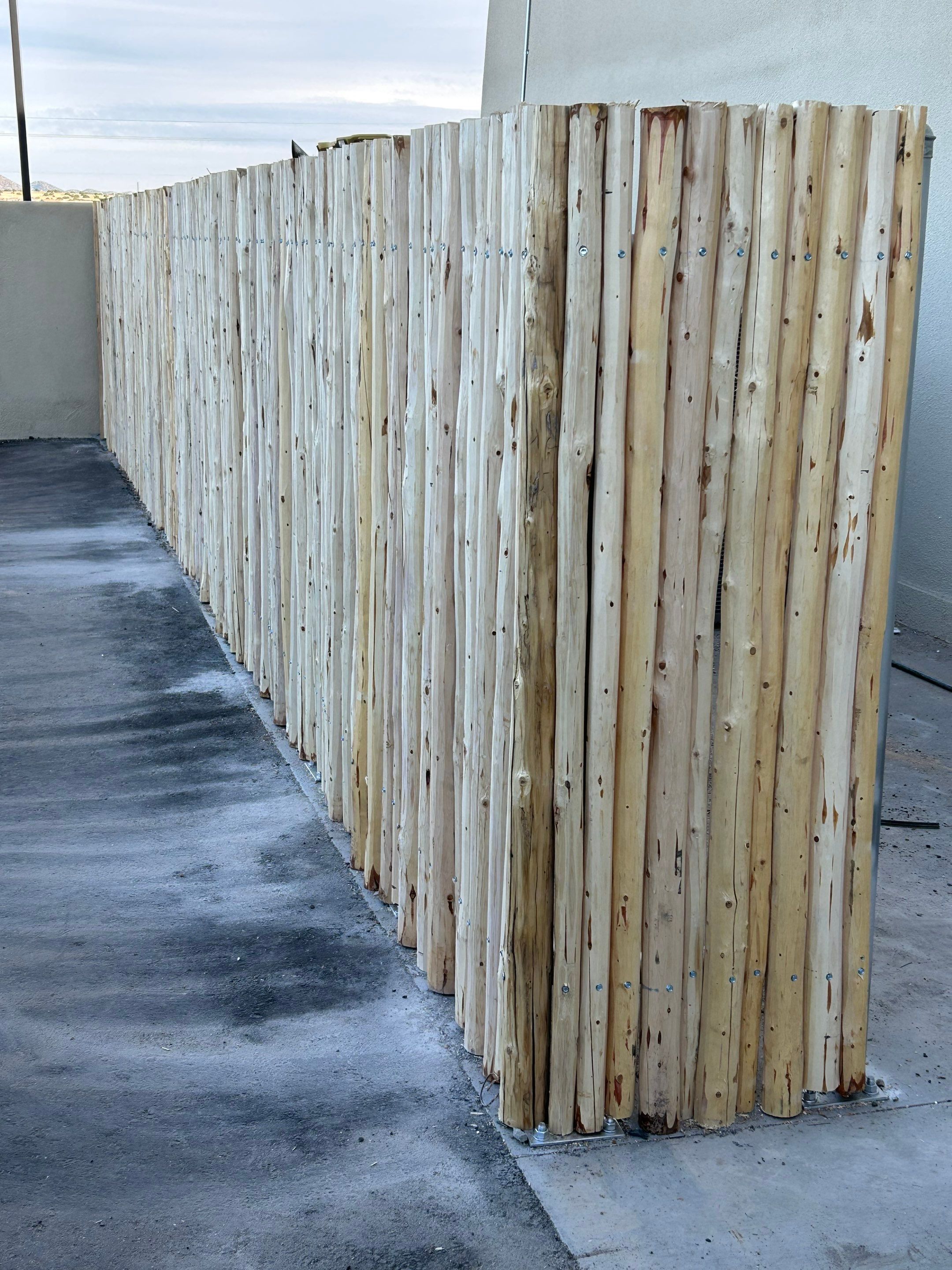 Commercial using Pealed Latilla by Valley Fence Company